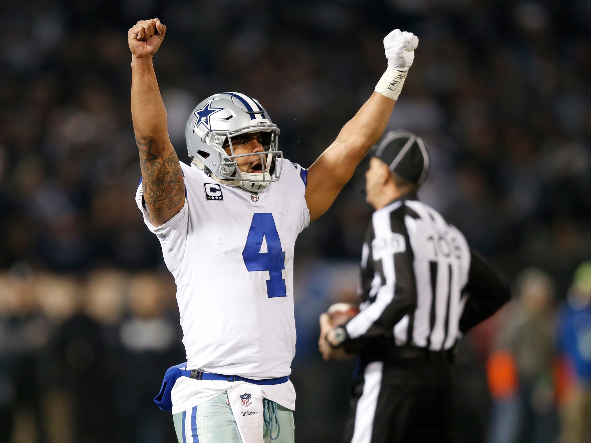 Dak Prescott celebrates after the Dallas Cowboys secured a late victory over Oakland Raiders