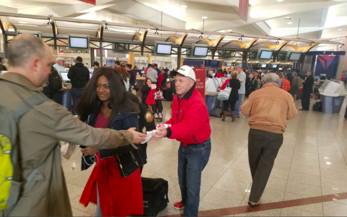 Midnight snack: food is handed out to stranded passengers after the power was restored