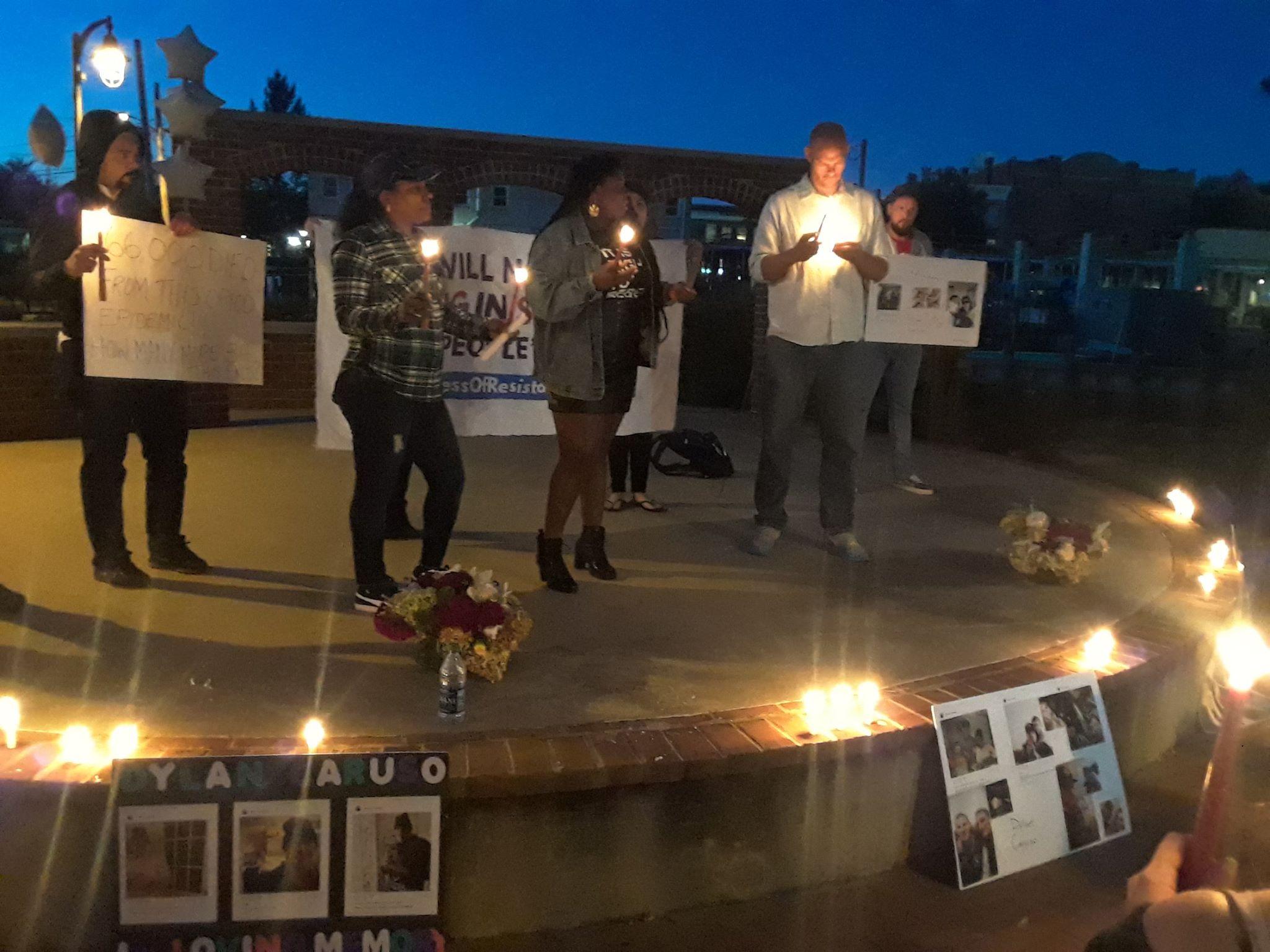 Members of the Suffolk County branch participate in a vigil for victims of the opioid crisis