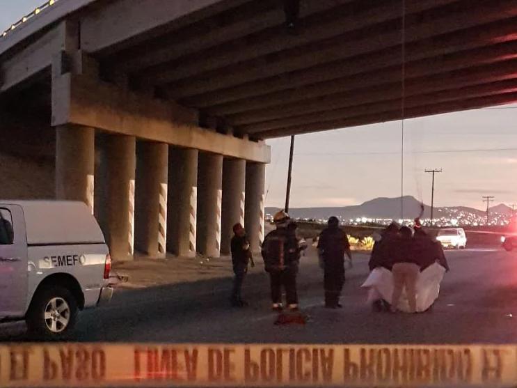 Rescuers attend to bodies that were hanged on the freeway to La Paz, Baja California Sur, Mexico on Wednesday