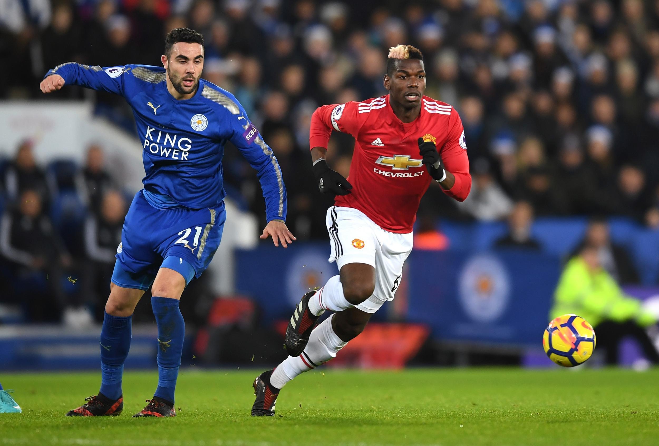 Paul Pogba races to get away from Vicente Iborra