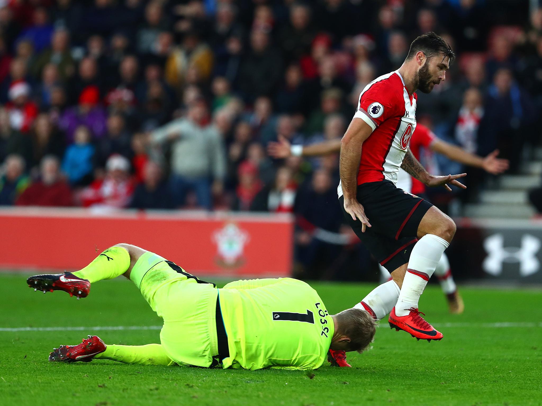 Charlie Austin faces a retrospective ban after being charged by the FA for violent conduct towards Jonas Lossl