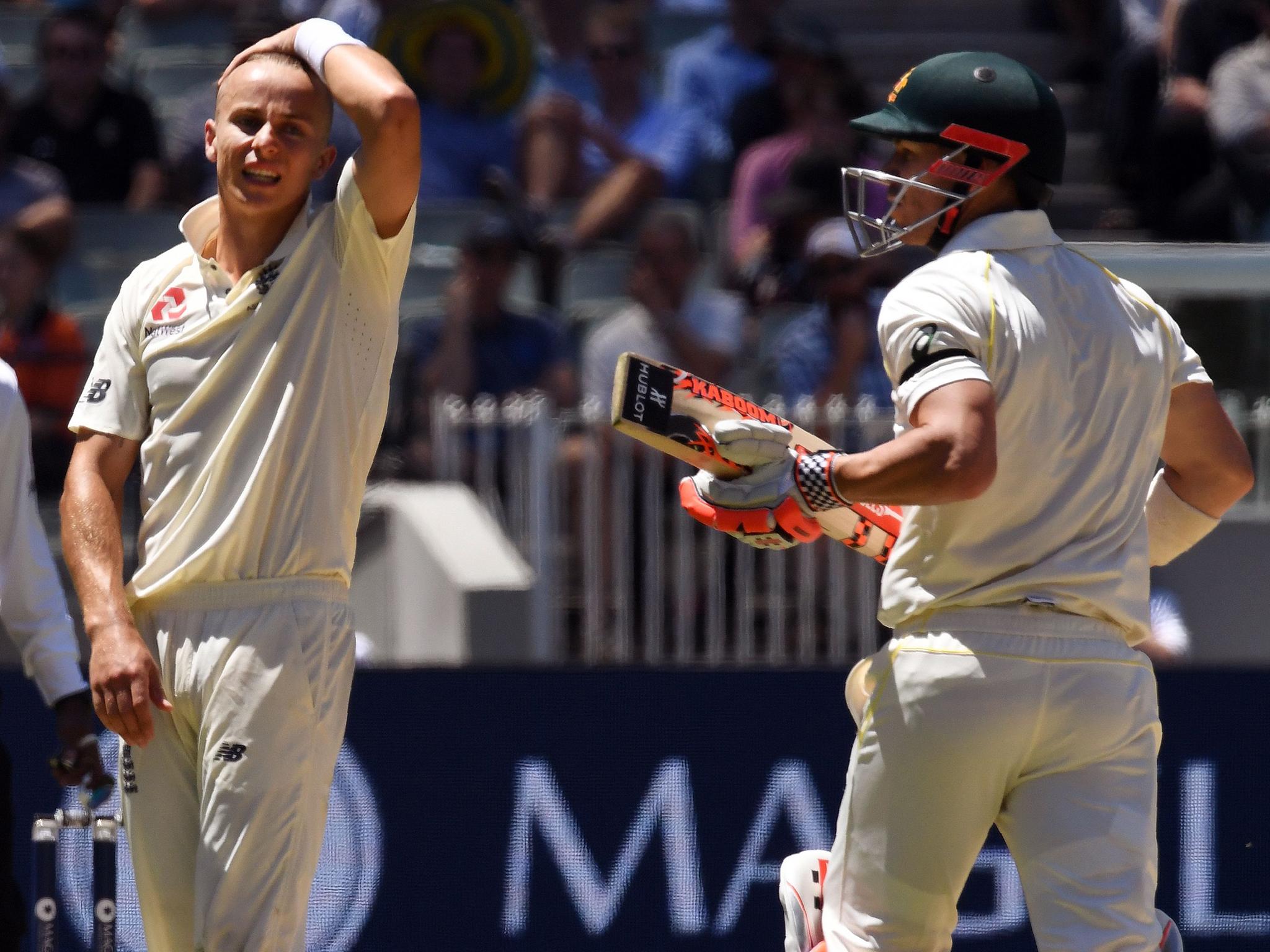 &#13;
Tom Curran was unlucky not to dismiss David Warner on 99 &#13;