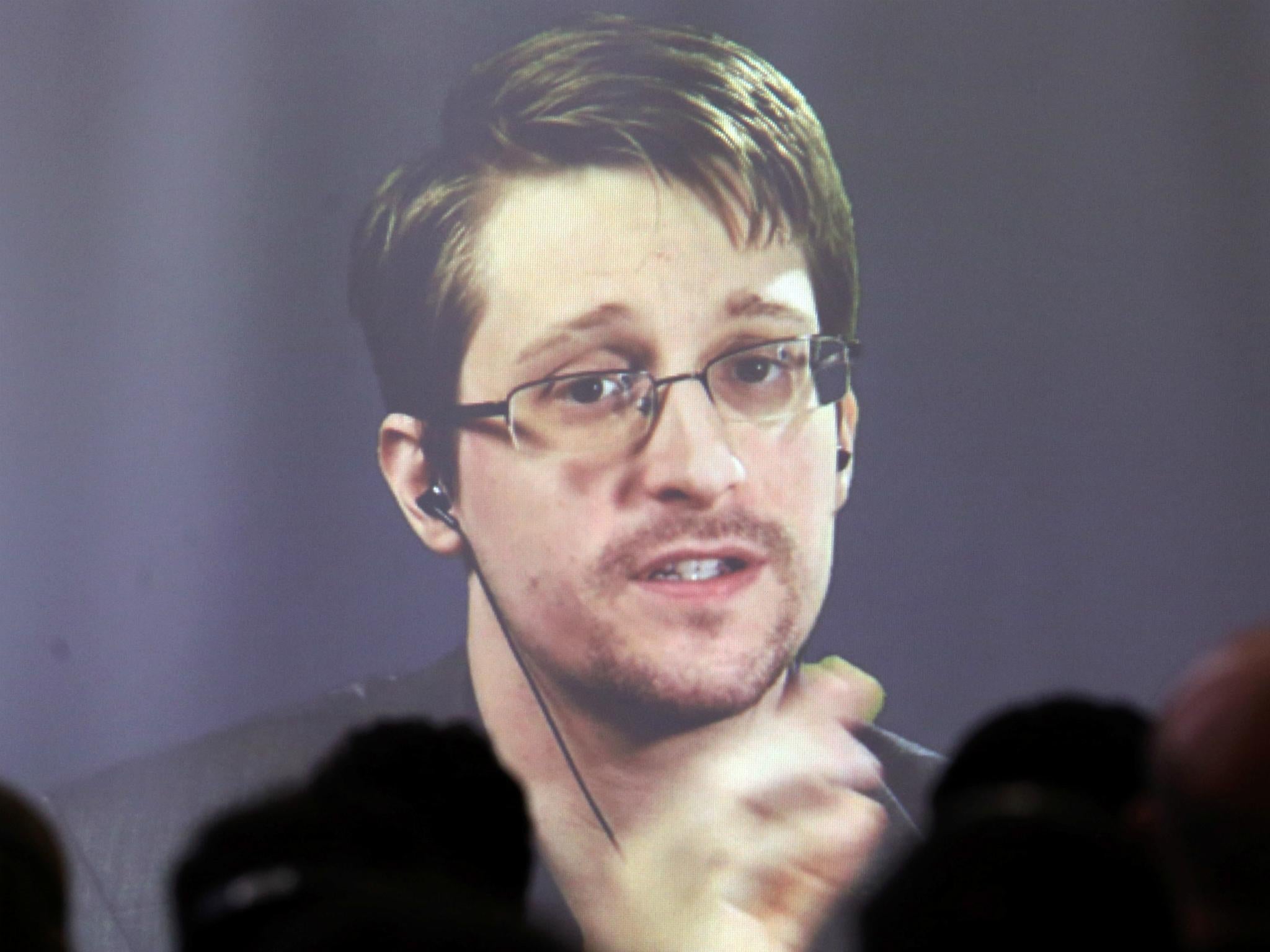 Edward Snowden speaks via video link during a conference at University of Buenos Aires Law School, Argentina, November 14, 2016