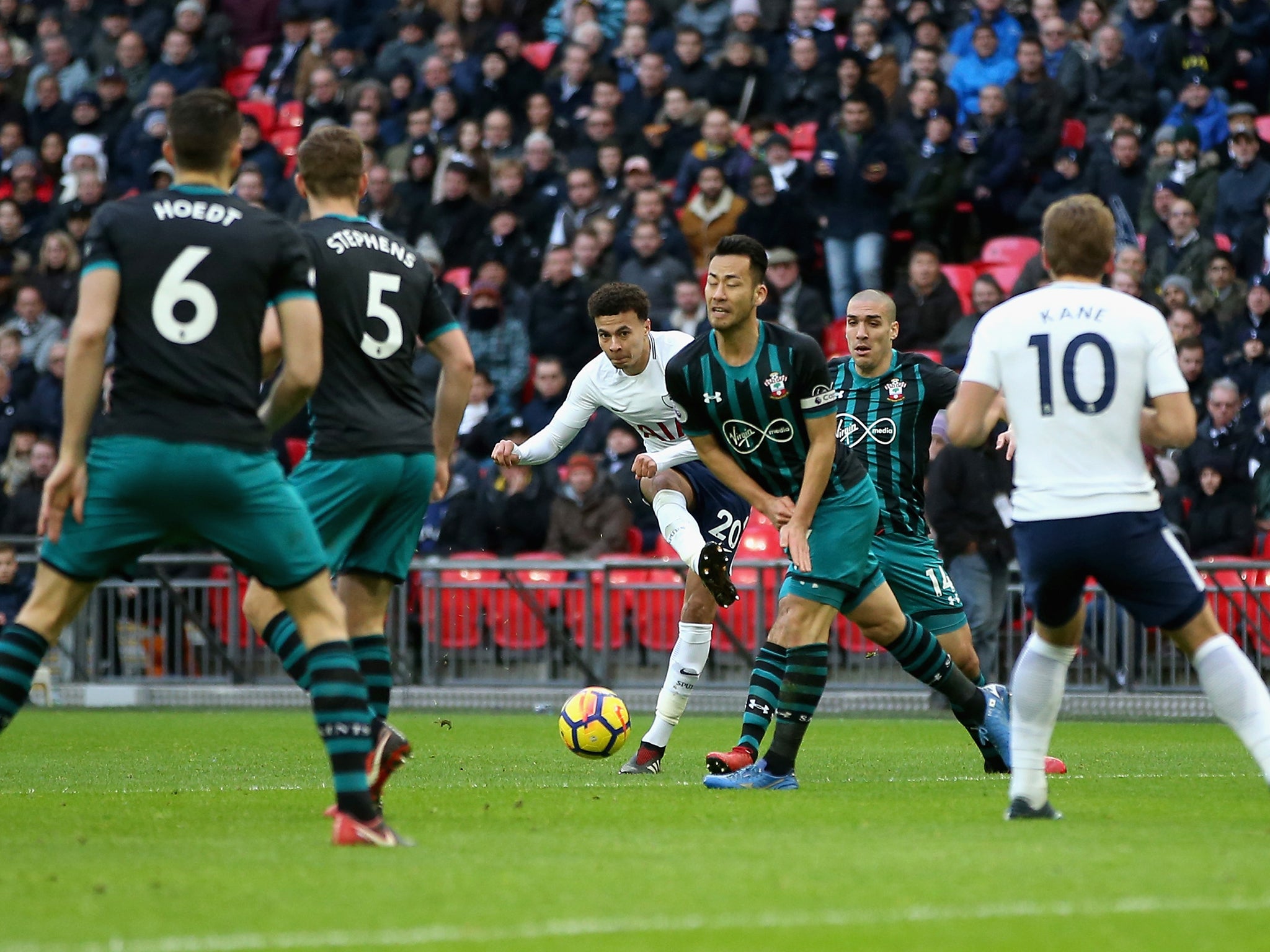 Dele Alli curled a low effort from the edge of the area in for the third goal