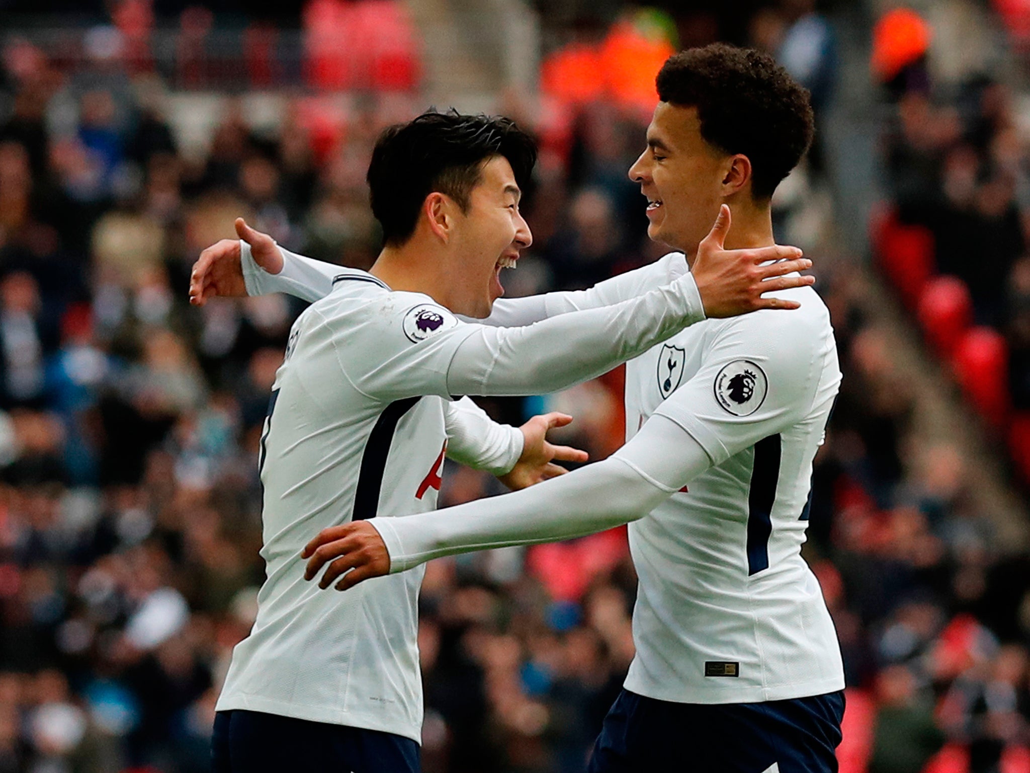 Son Heung-min celebrates with Dele Alli after scoring Tottenham's fourth goal