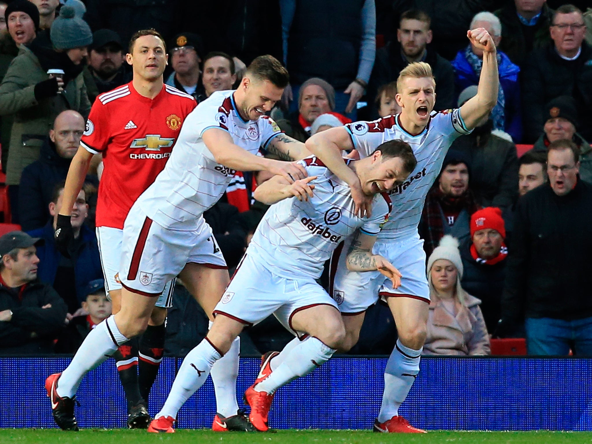 Burnley celebrate after Ashley Barnes opens the scoring against Manchester United