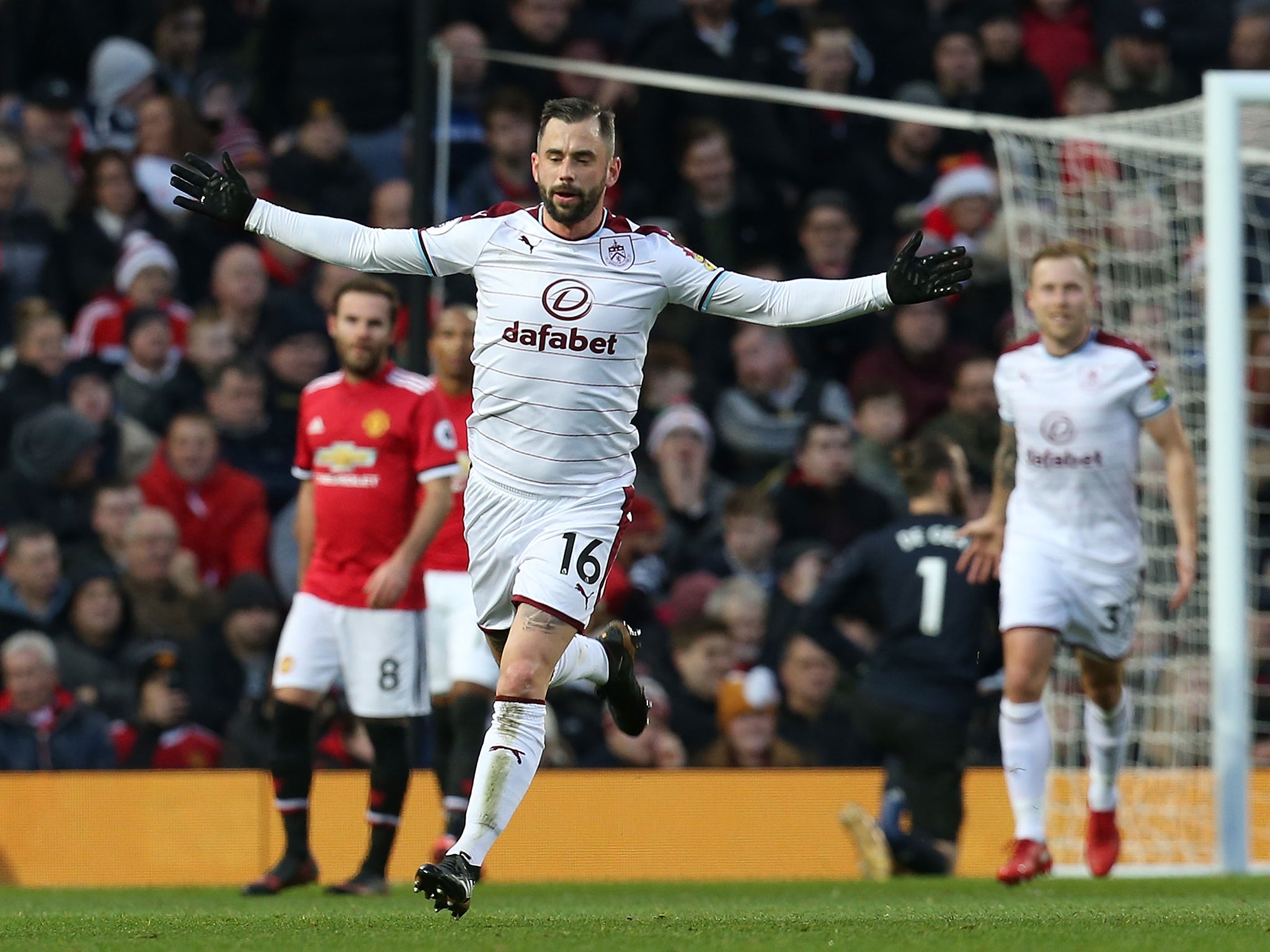 Steven Defour celebrates after scoring a free-kick to put Burnley 2-0 up