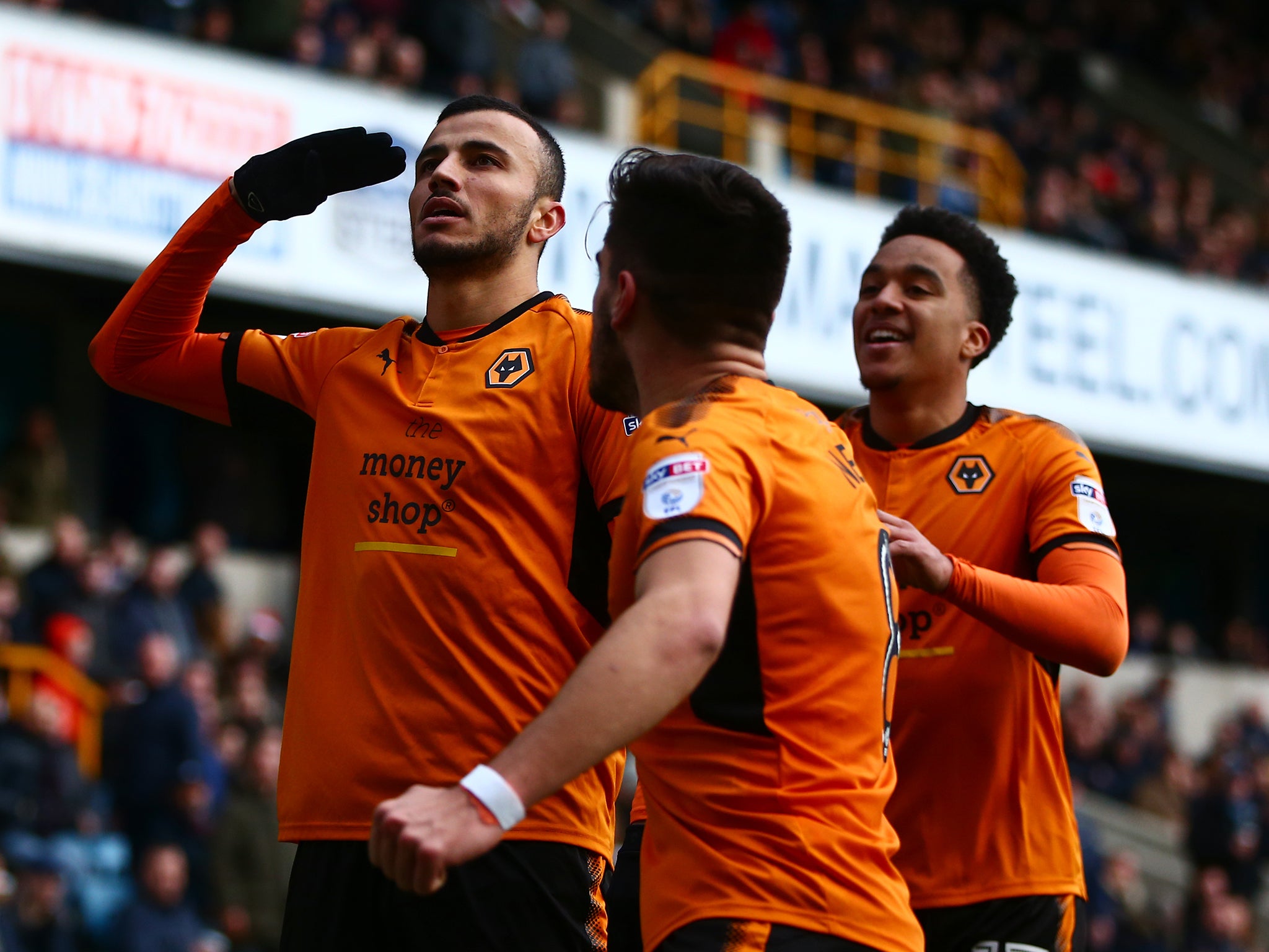 Romain Saiss celebrates scoring for Wolves against Millwall