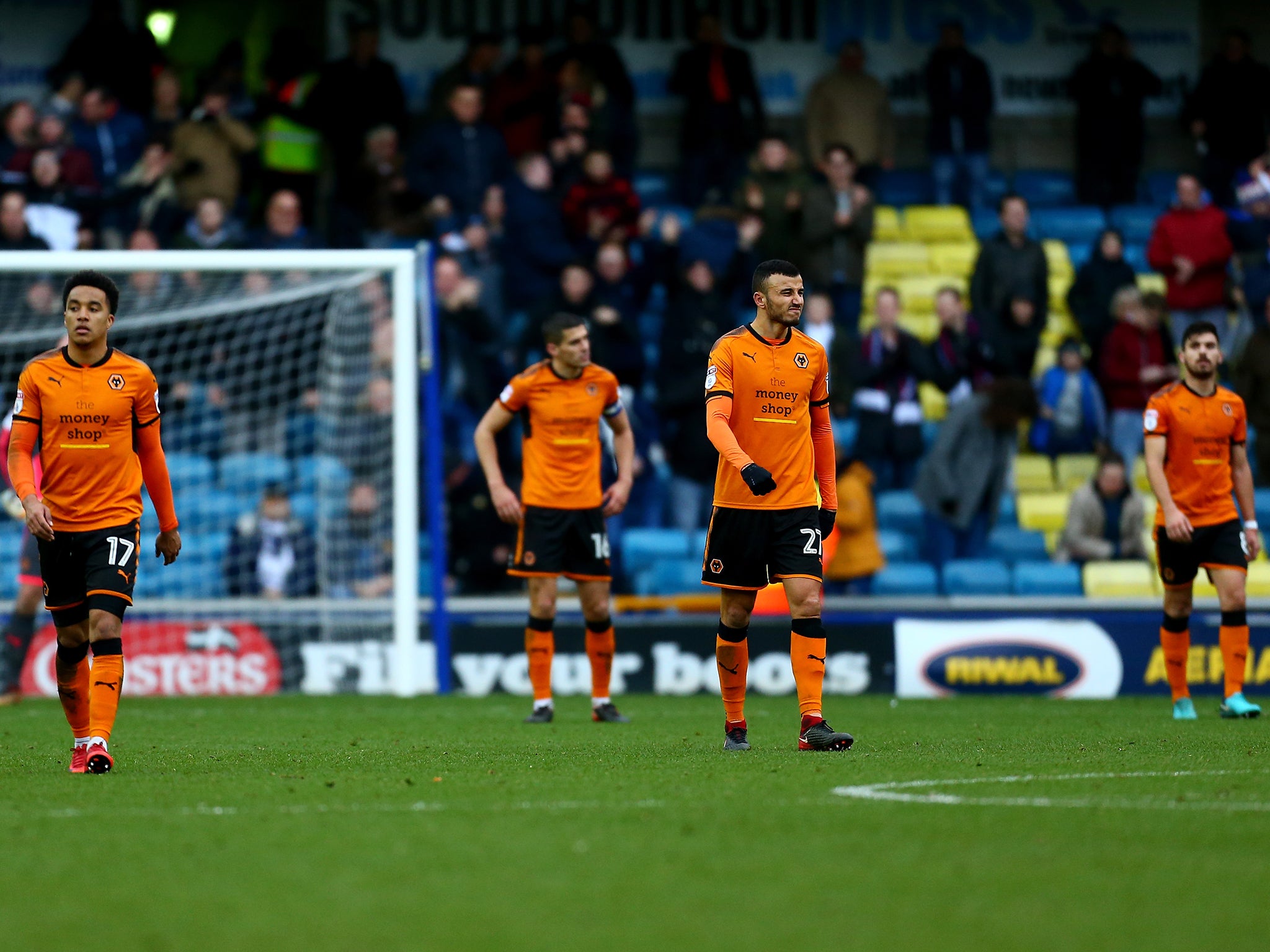 Wolves players appear dejected after Jake Cooper's equaliser for Millwall