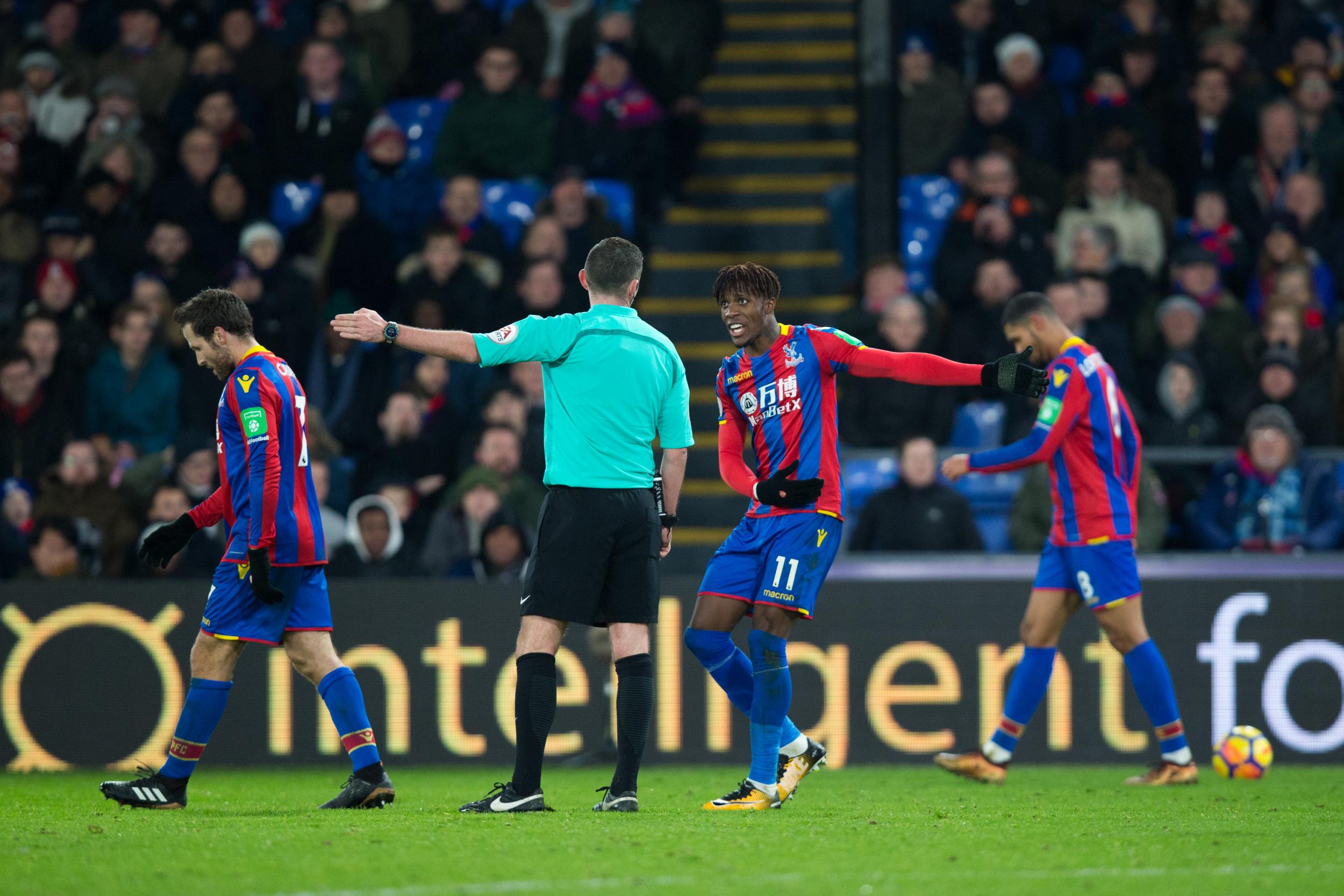 Wilfried Zaha debates the game’s finer points (Getty)