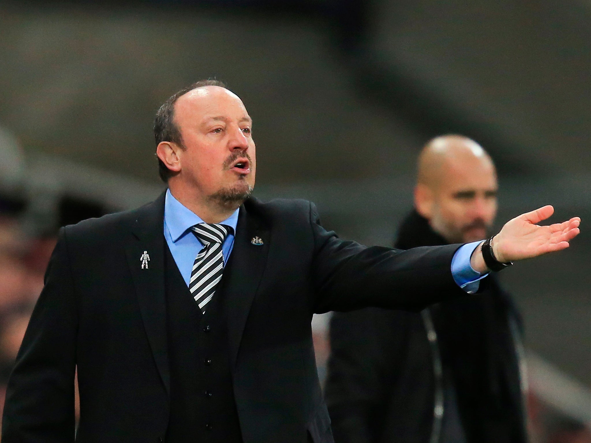 Rafa Benitez's Newcastle sit three points behind Hughton's Brighton