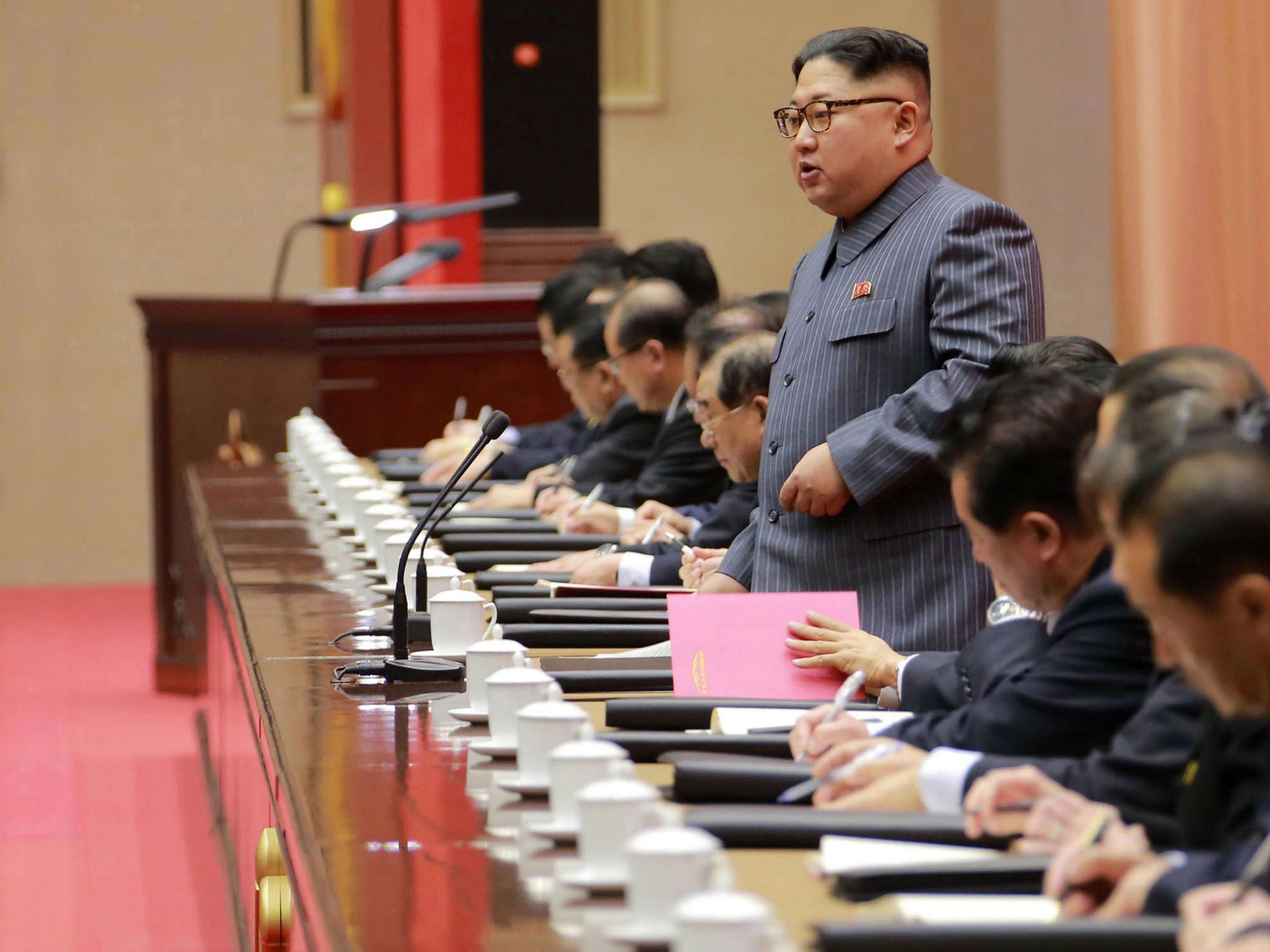 North Korean leader Kim Jong Un addresses a ruling party conference in Pyongyang