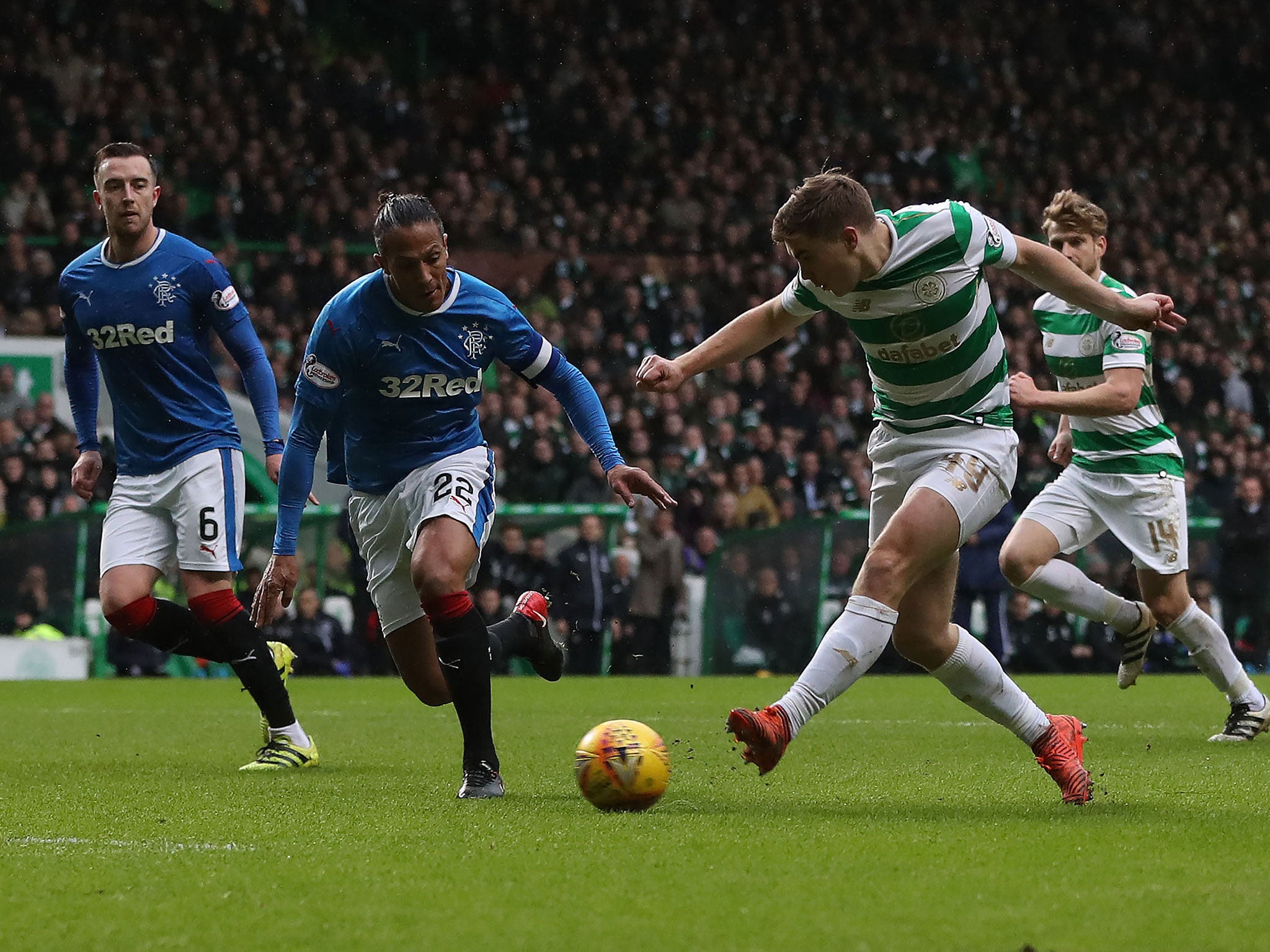 James Forrest takes a shot on goal for Celtic