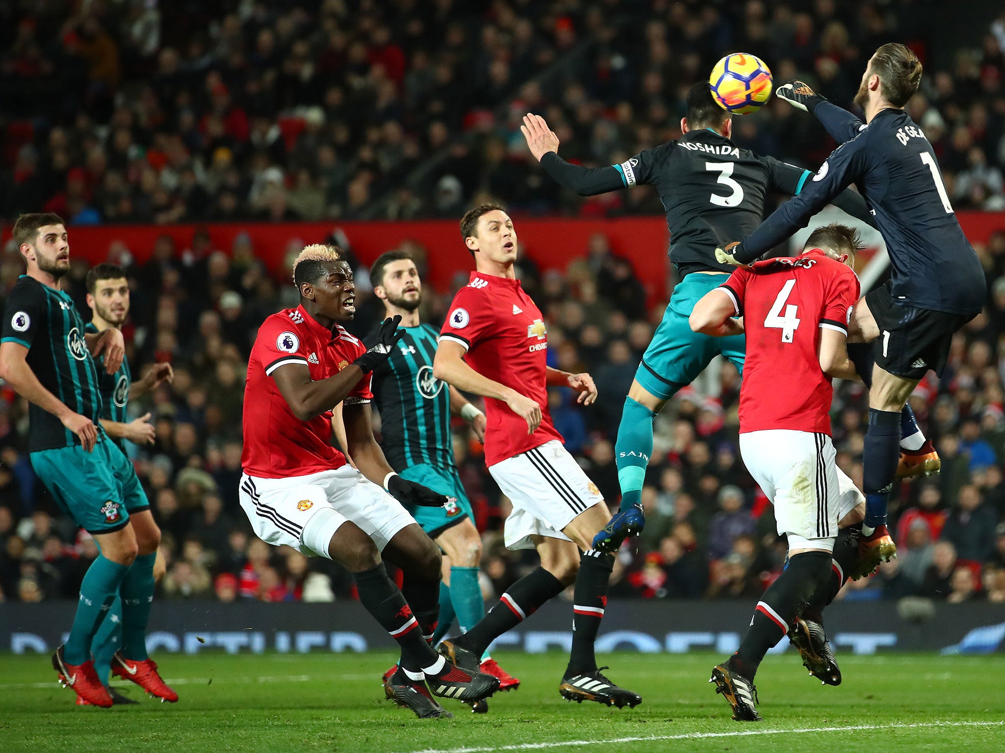 David de Gea punches clear a Southampton delivery in the second half