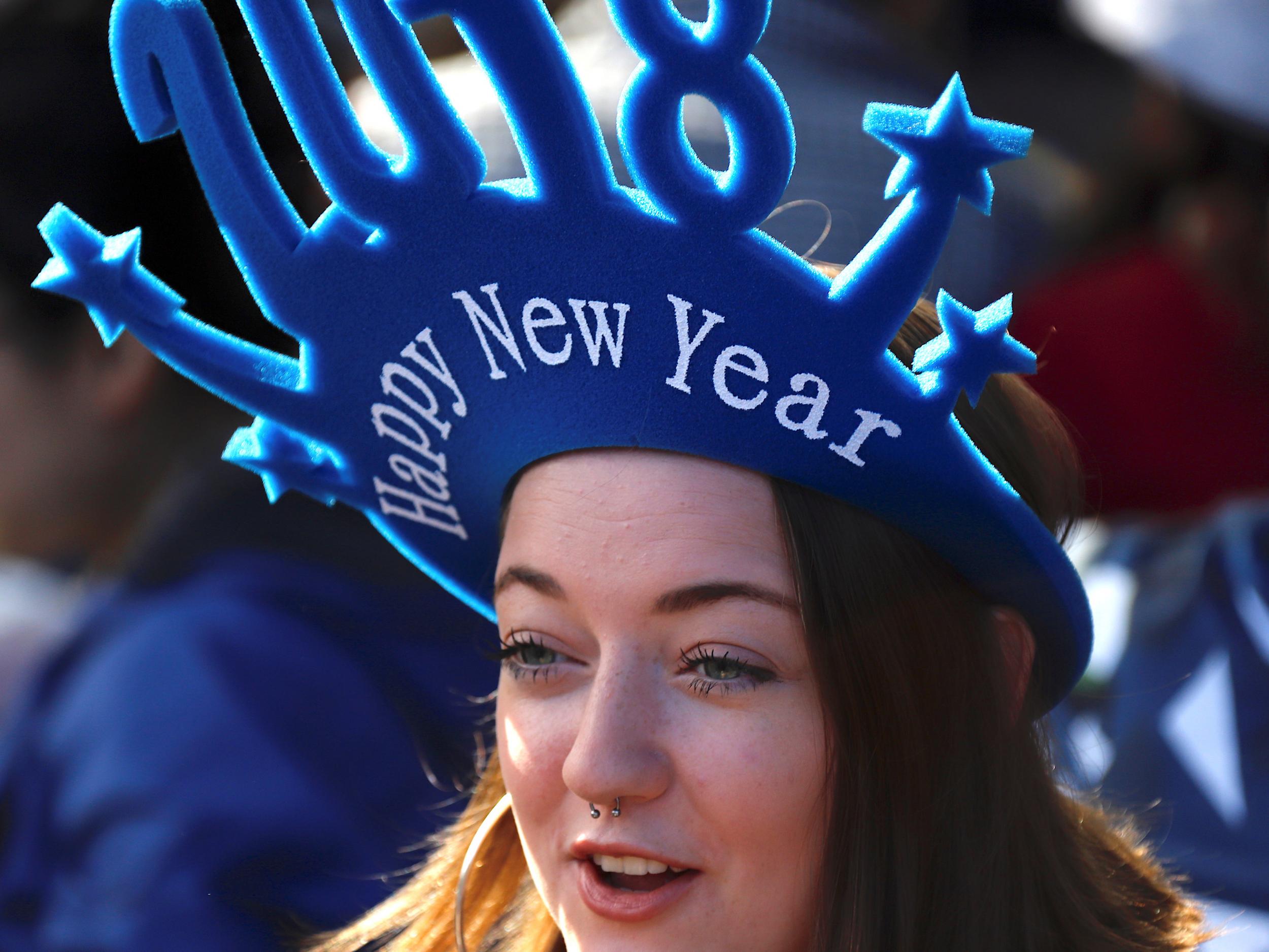 Edinburgh's Hogmanay festival opened with an iconic torchlight procession which also marked the start of Scotland's Year of Young People