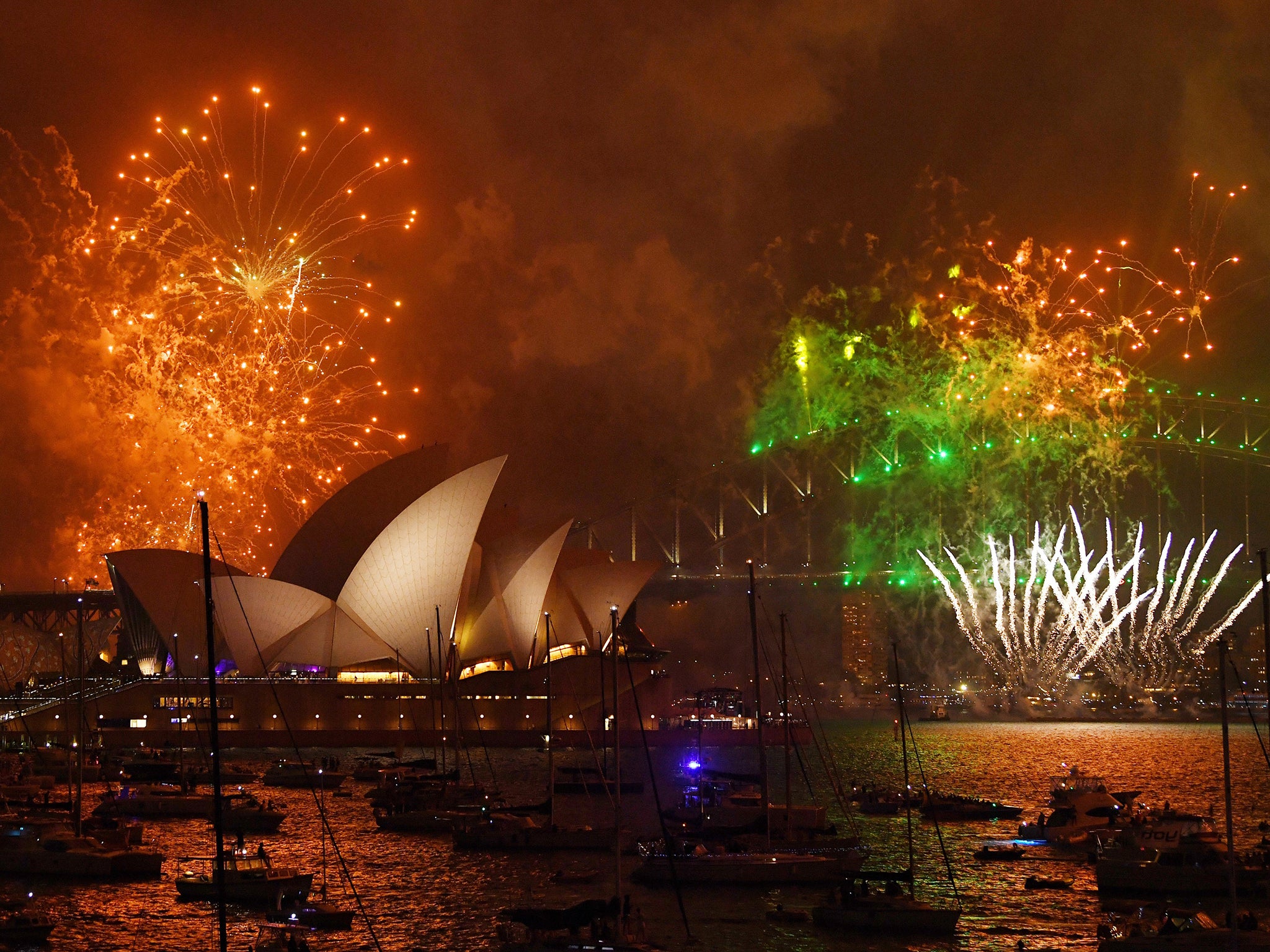 Fireworks explode over Sydney Harbour during New Year's Eve celebrations