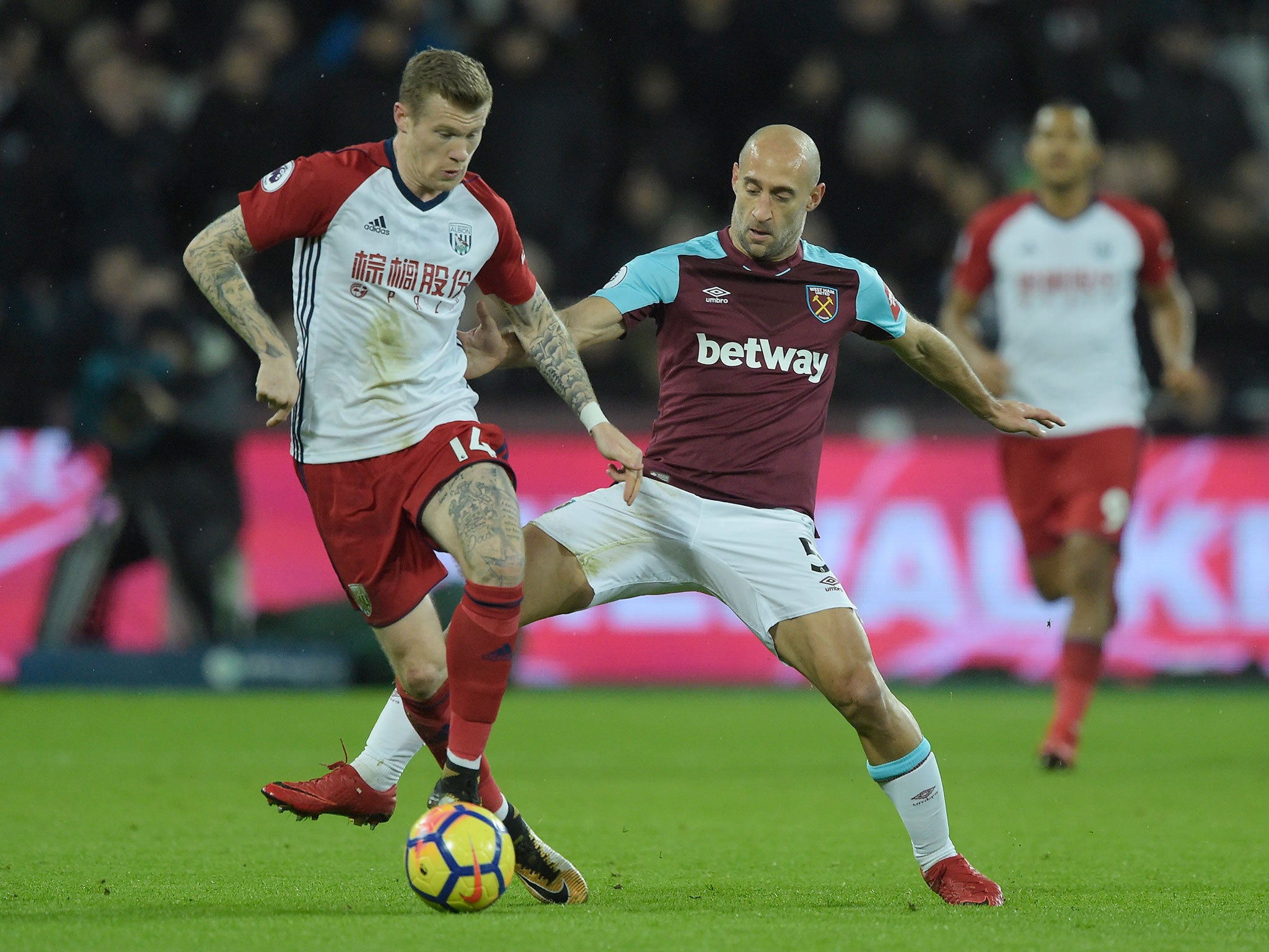 Pablo Zabaleta attempts to dispossess James McClean