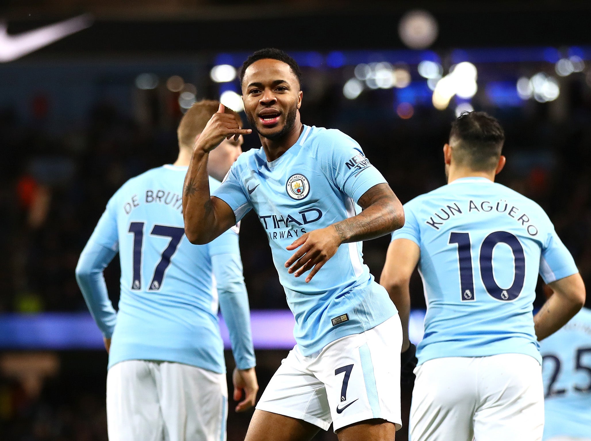 Raheem Sterling celebrates City's early strike