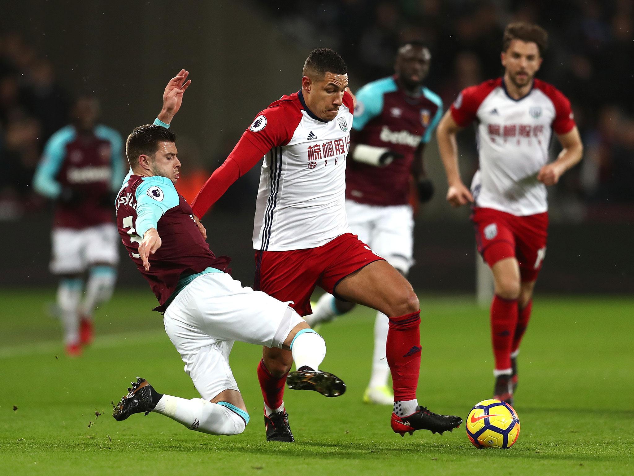 West Brom assistant manager John Carver was also involved in a confrontation with West Ham fans