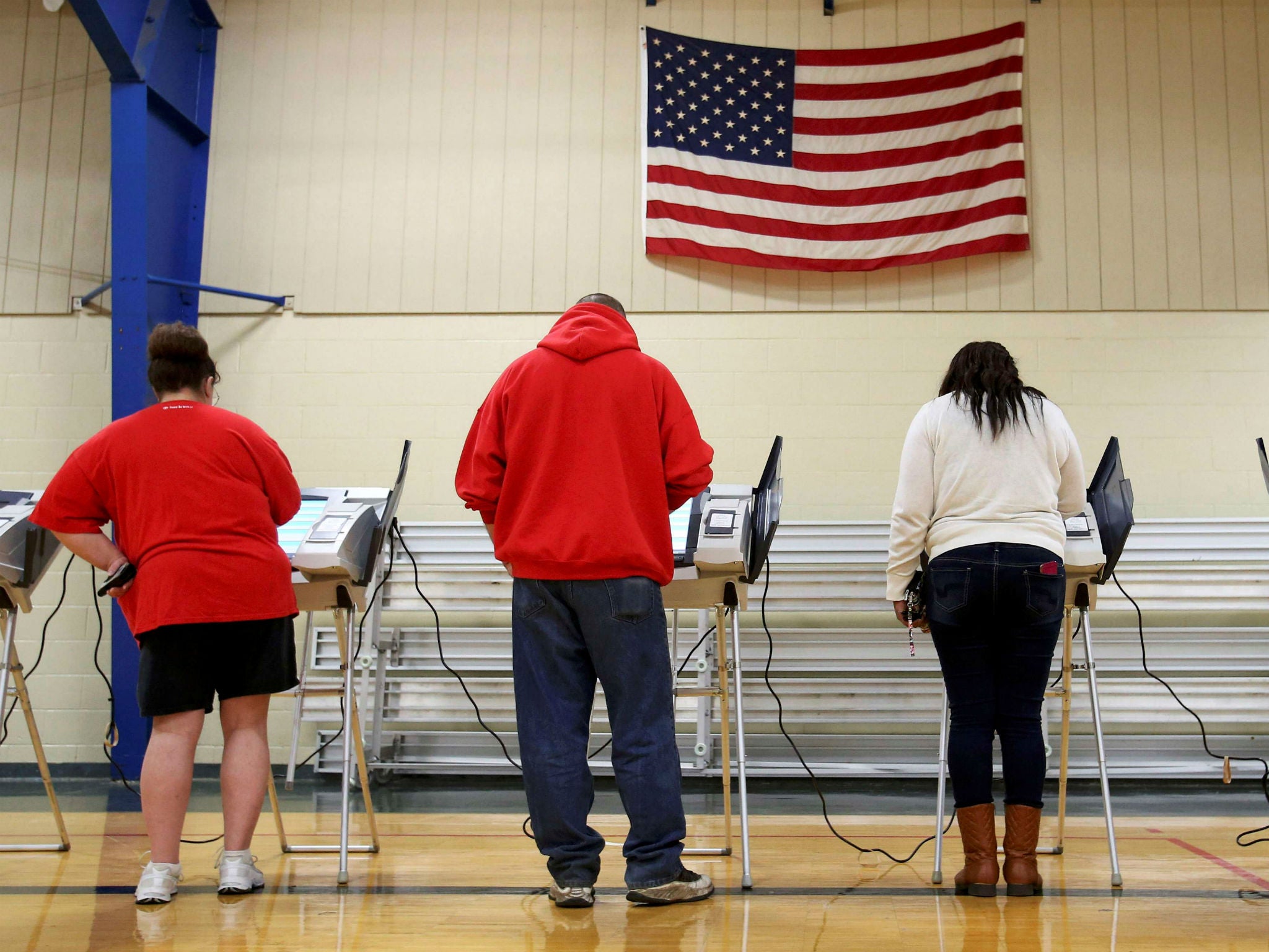 Voters cast their votes during the 2016 US presidential election in Elyria, Ohio