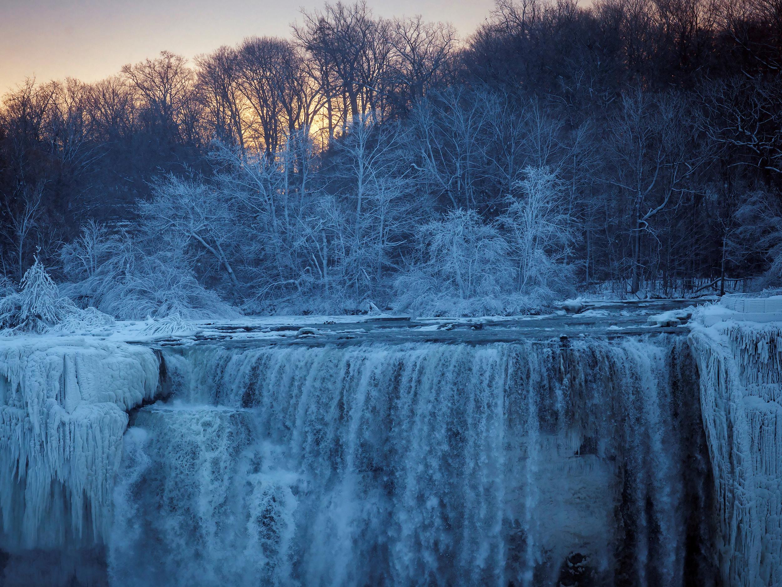 Niagara Falls, on the border of New York and Ontario, on Wednesday. Scientists are studying how climate change is influencing cold snaps in North America and Europe