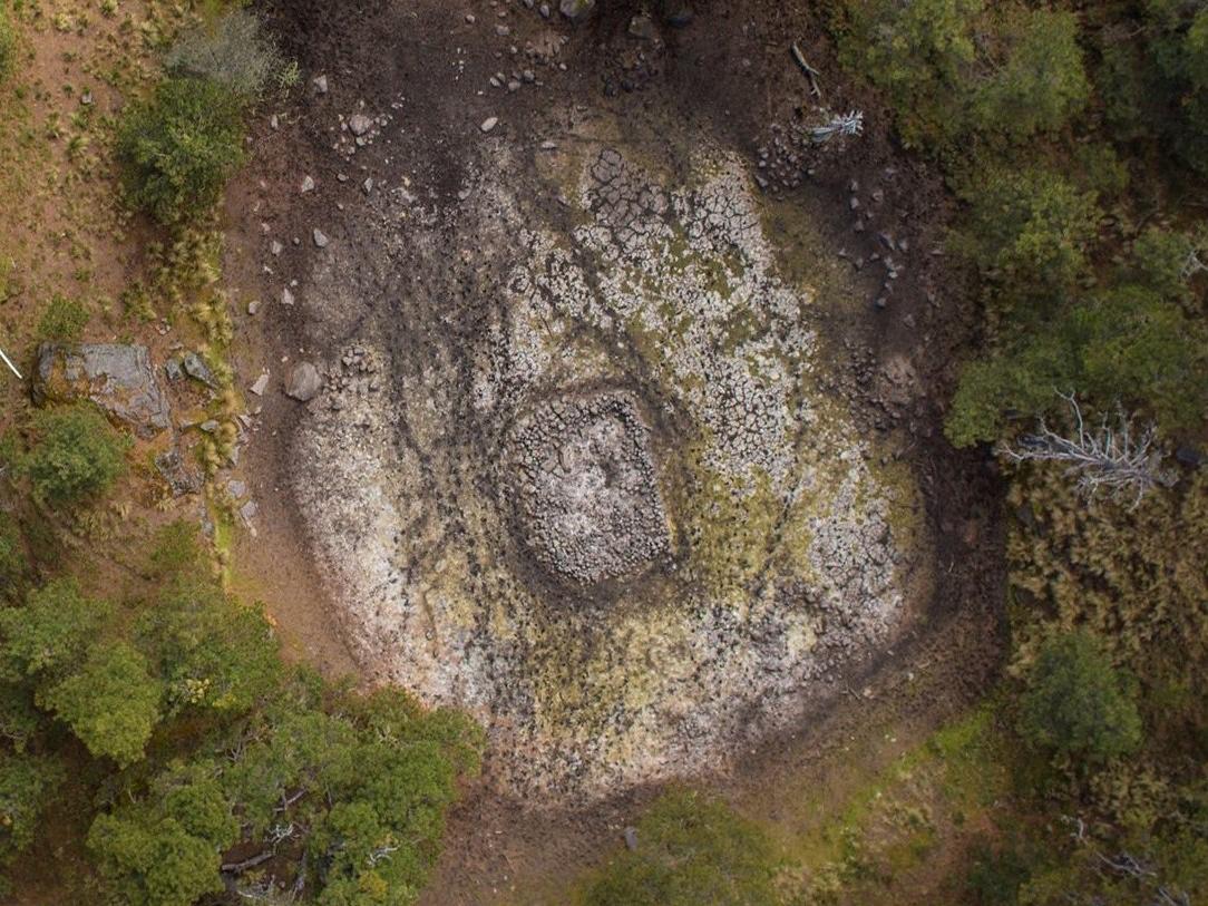 The Nahualac shrine site viewed from above shows the submerged structure in the pond