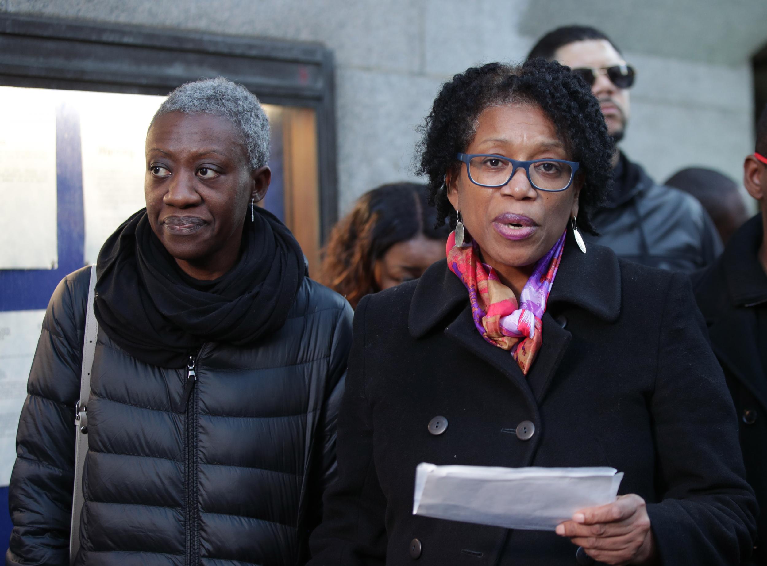 Valerie Archibold (left) and Lorraine Jones (right), the sisters of Angela Best, speak to the media outside the Old Bailey, London, after serial killer Theodore Johnson was jailed for a minimum term of 26 years for murdering his former partner Best