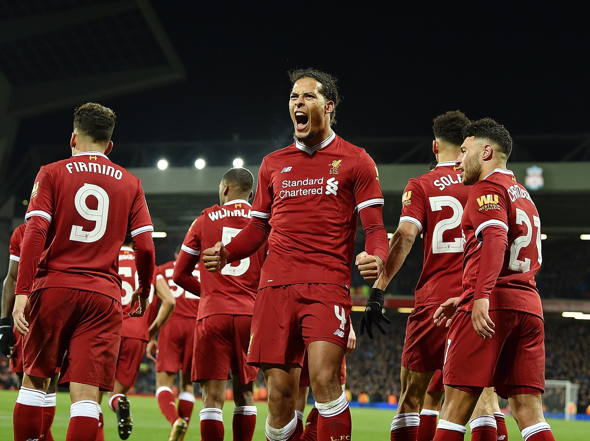 Virgil van Dijk celebrates his winning header