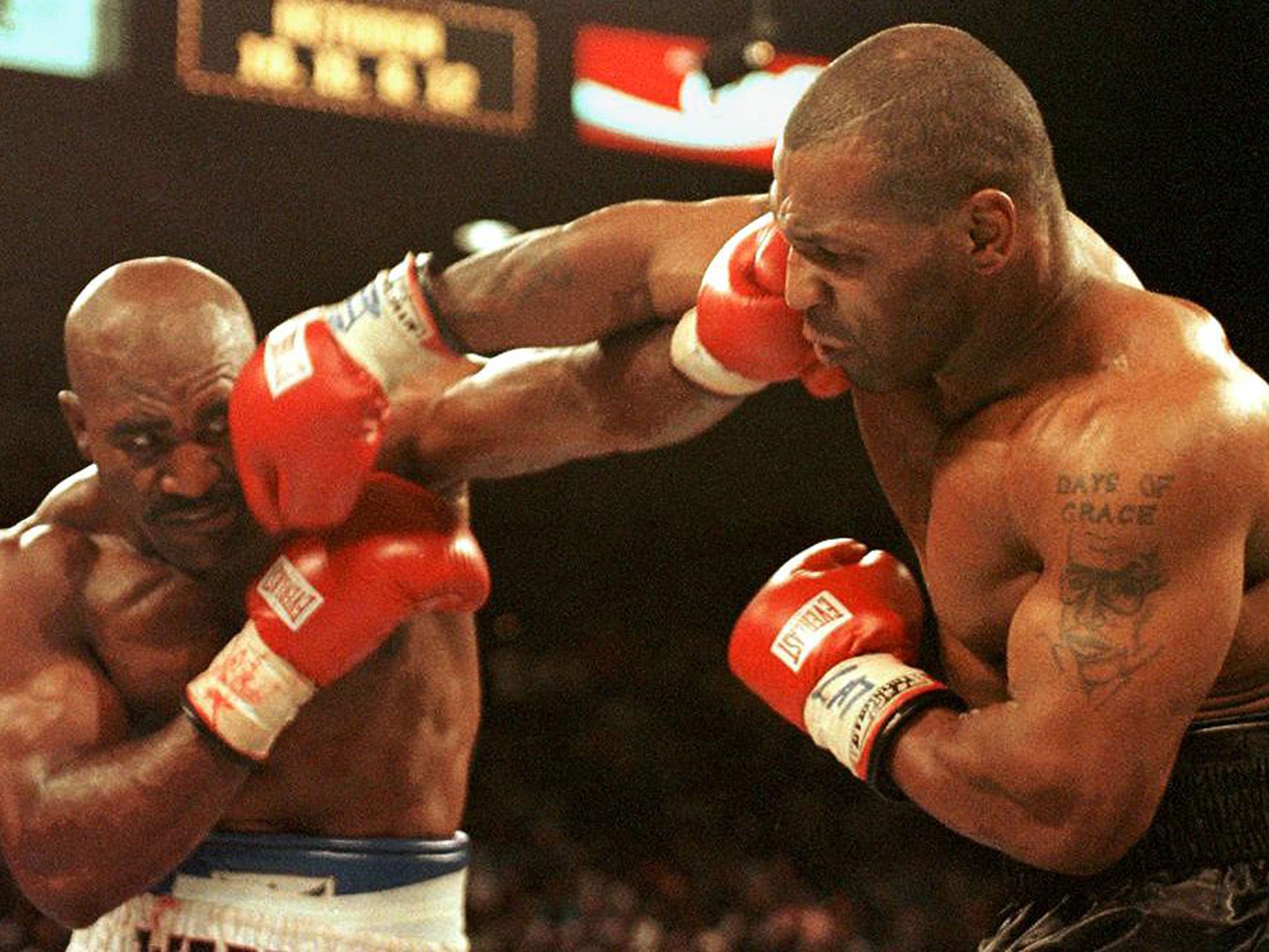 Mike Tyson in action against Evander Holyfield before biting his opponent’s ear