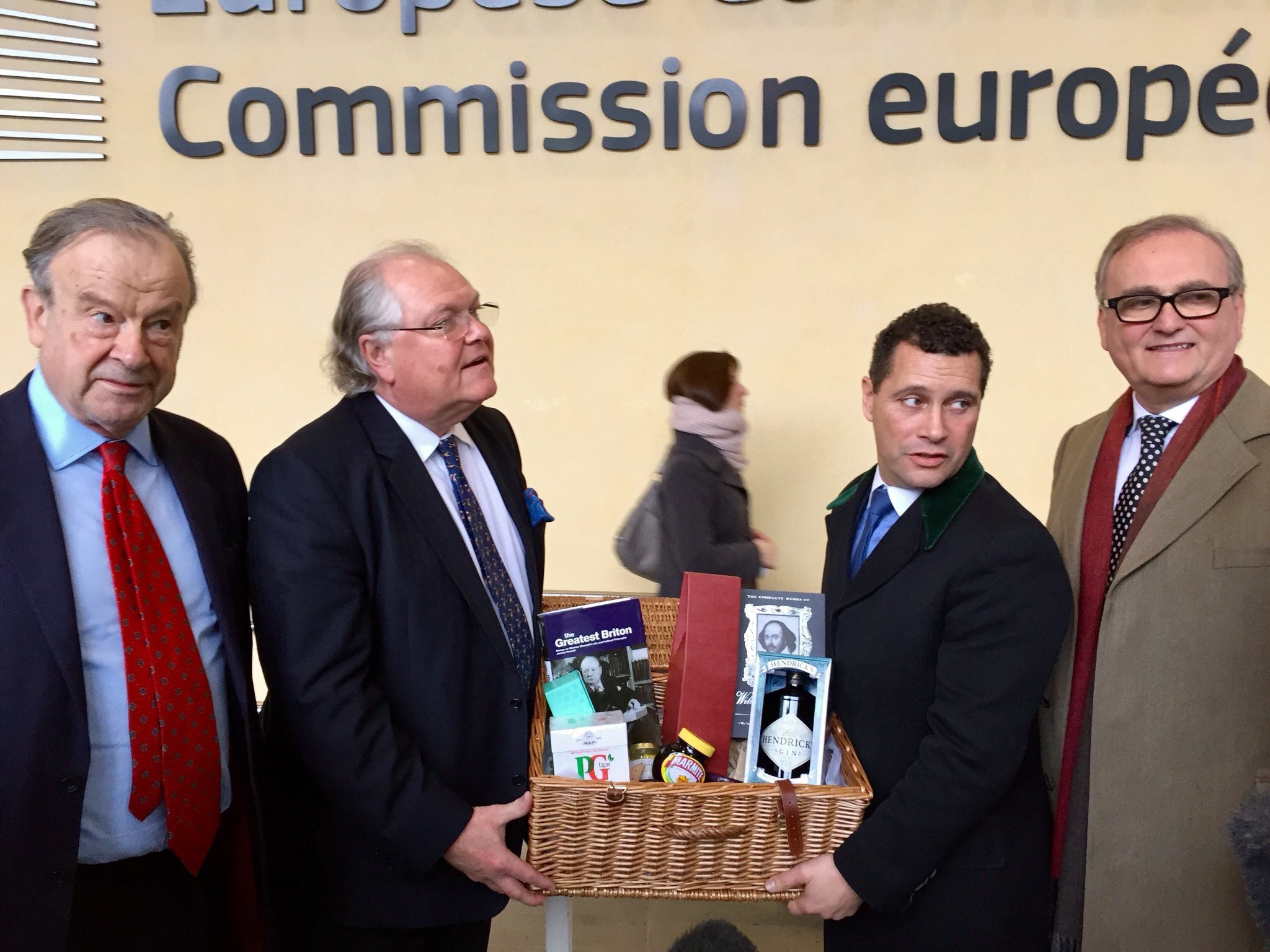 The hamper, delivered by Brexit campaigners including by former CBI head Digby Jones (second left) and MEP Steven Woolfe (third left)