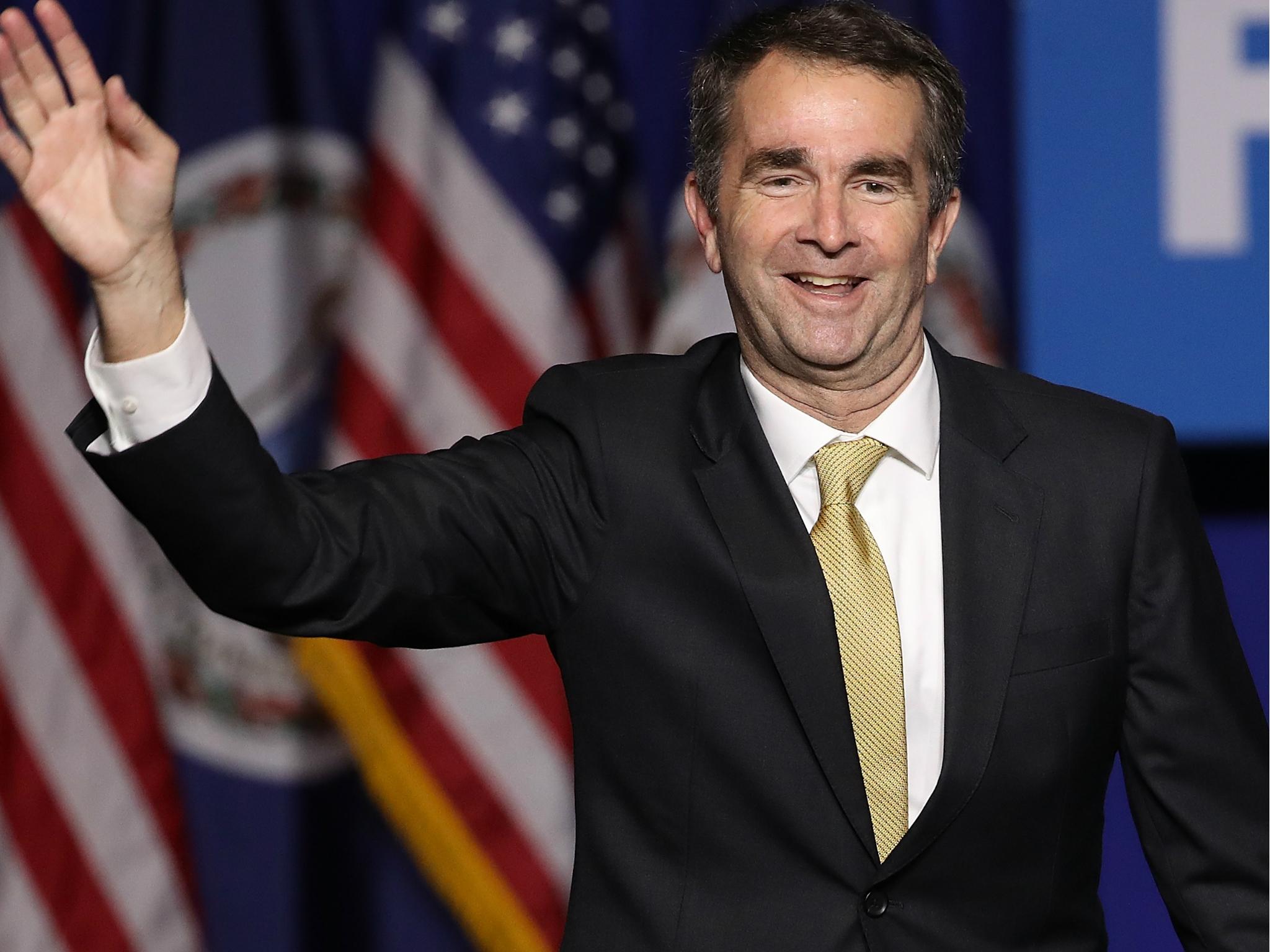 Virginia Governor Ralph Northam waves to supporters at an election night rally 7 November 2017 in Fairfax, Virginia
