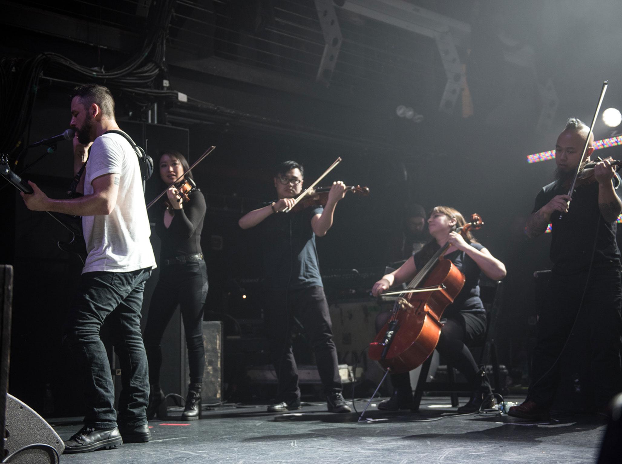 The Dillinger Escape Plan's Ben Weinman alongside string quartet seven)suns