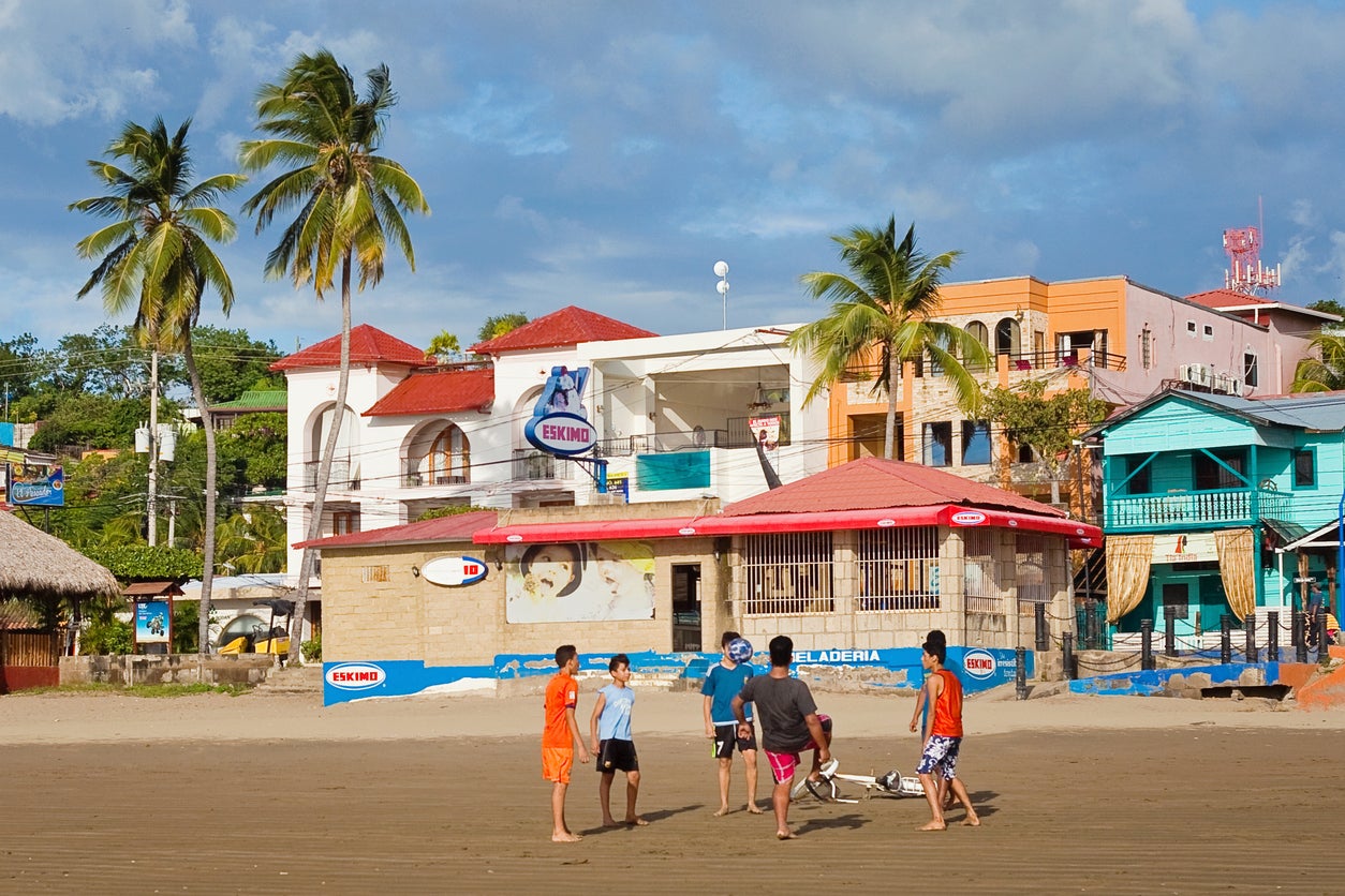 A group of boys playing football in San Juan del Sur, Nicaragua (Getty)