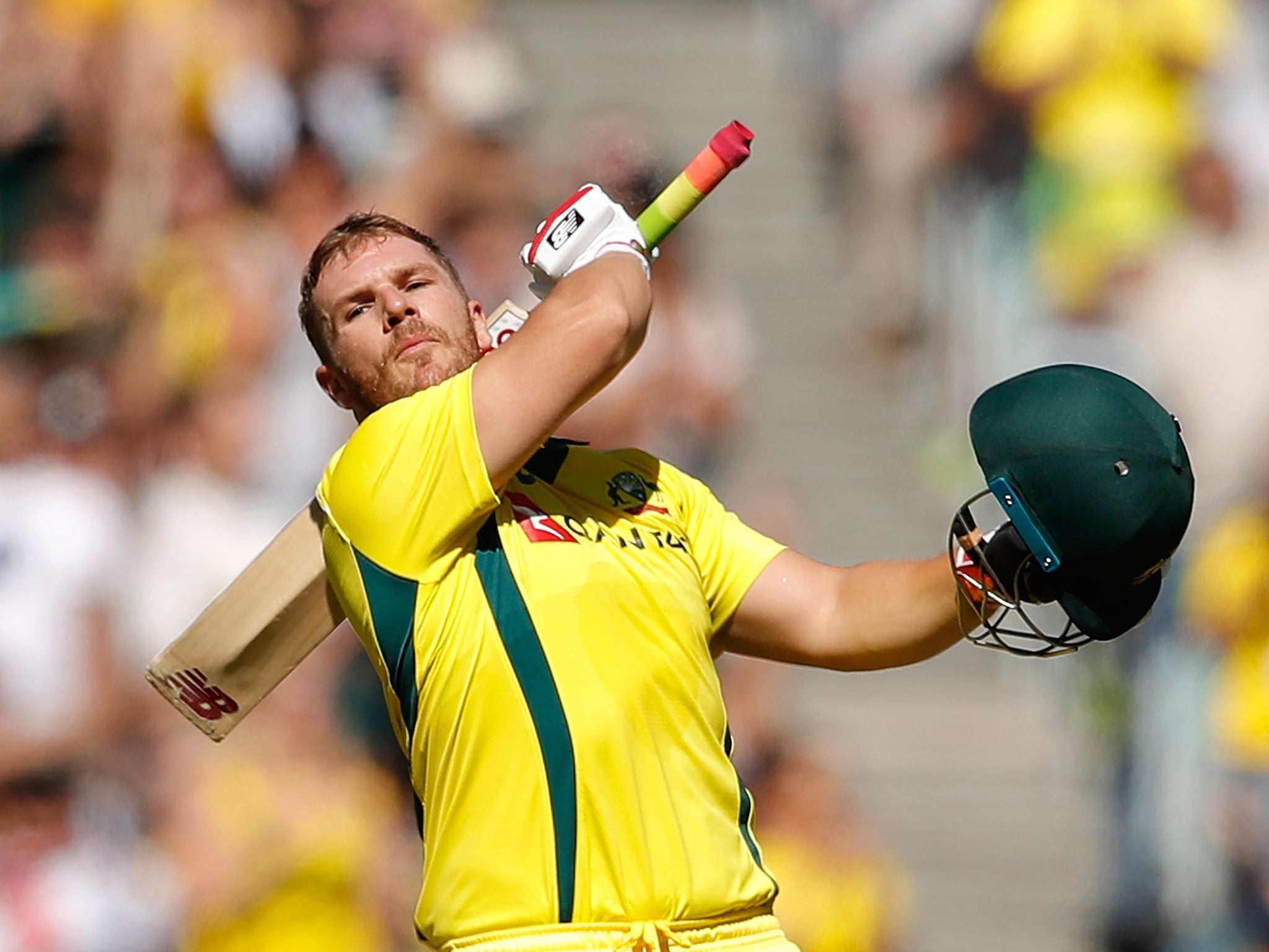 Aaron Finch celebrates reaching his century for Australia