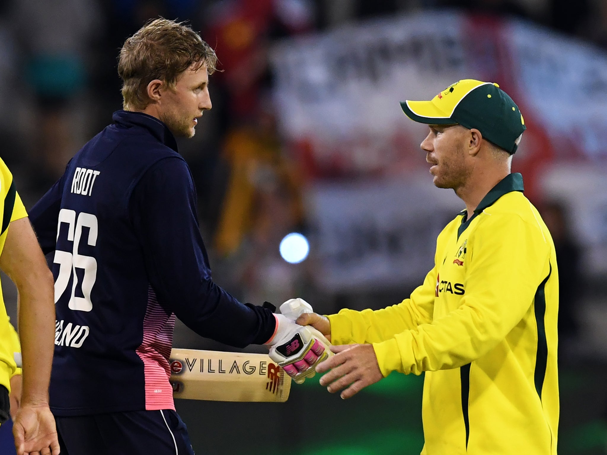 Joe Root shakes hands with David Warner after England's victory