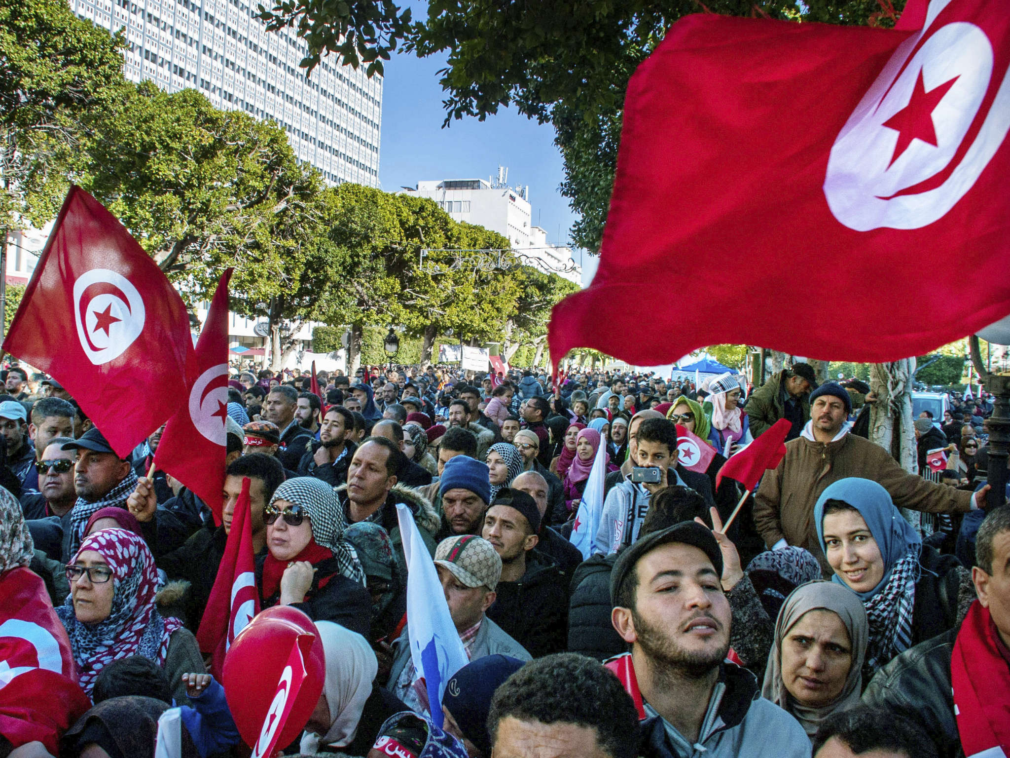 A rally in Tunis to mark seven years since the Jasmine Revolution – but beneath the surface anger is brewing in Tunisian society