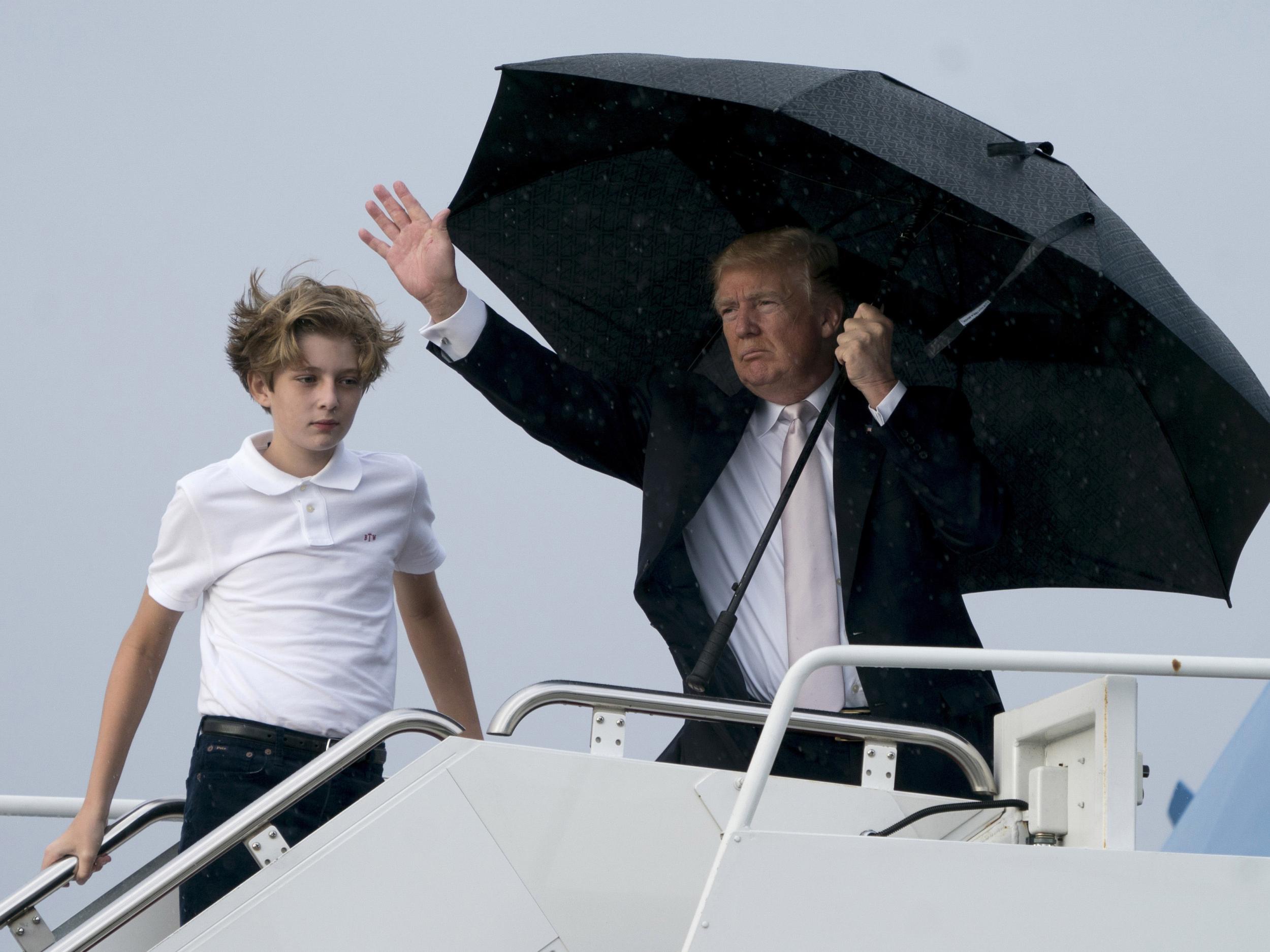 President Donald Trump boards Air Force One at Palm Beach International Airport in West Palm Beach