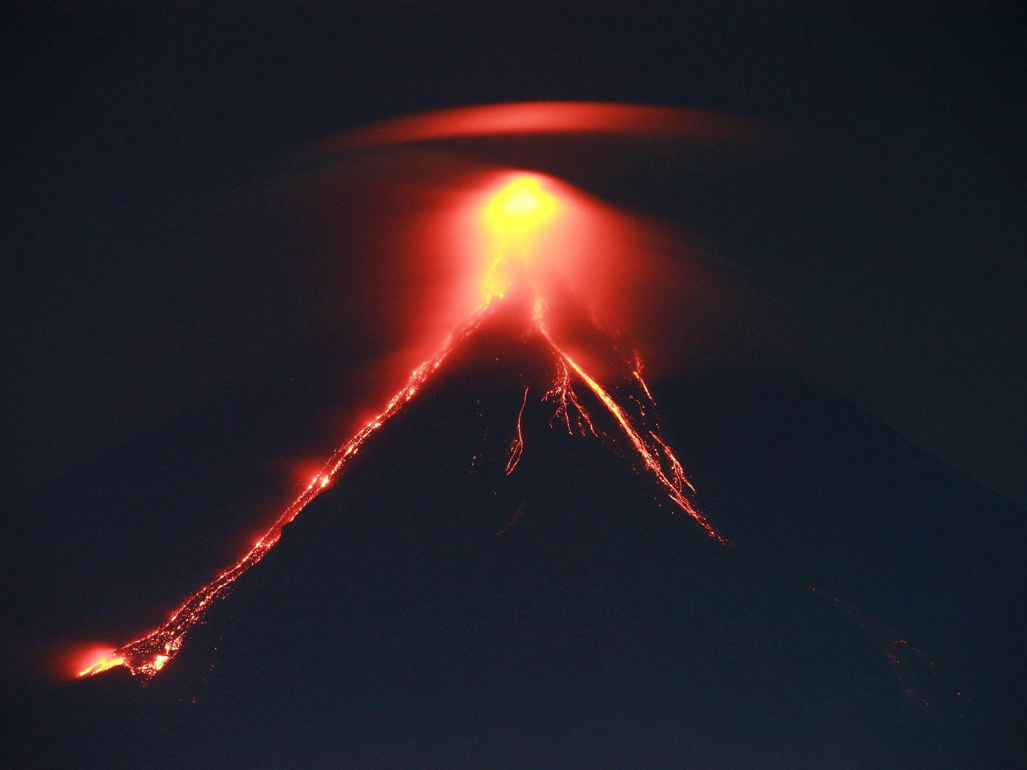 Spectacular lava 'fireworks' shooting from Mount Mayon's crater are drawing tourists to the Philippines' most active volcano