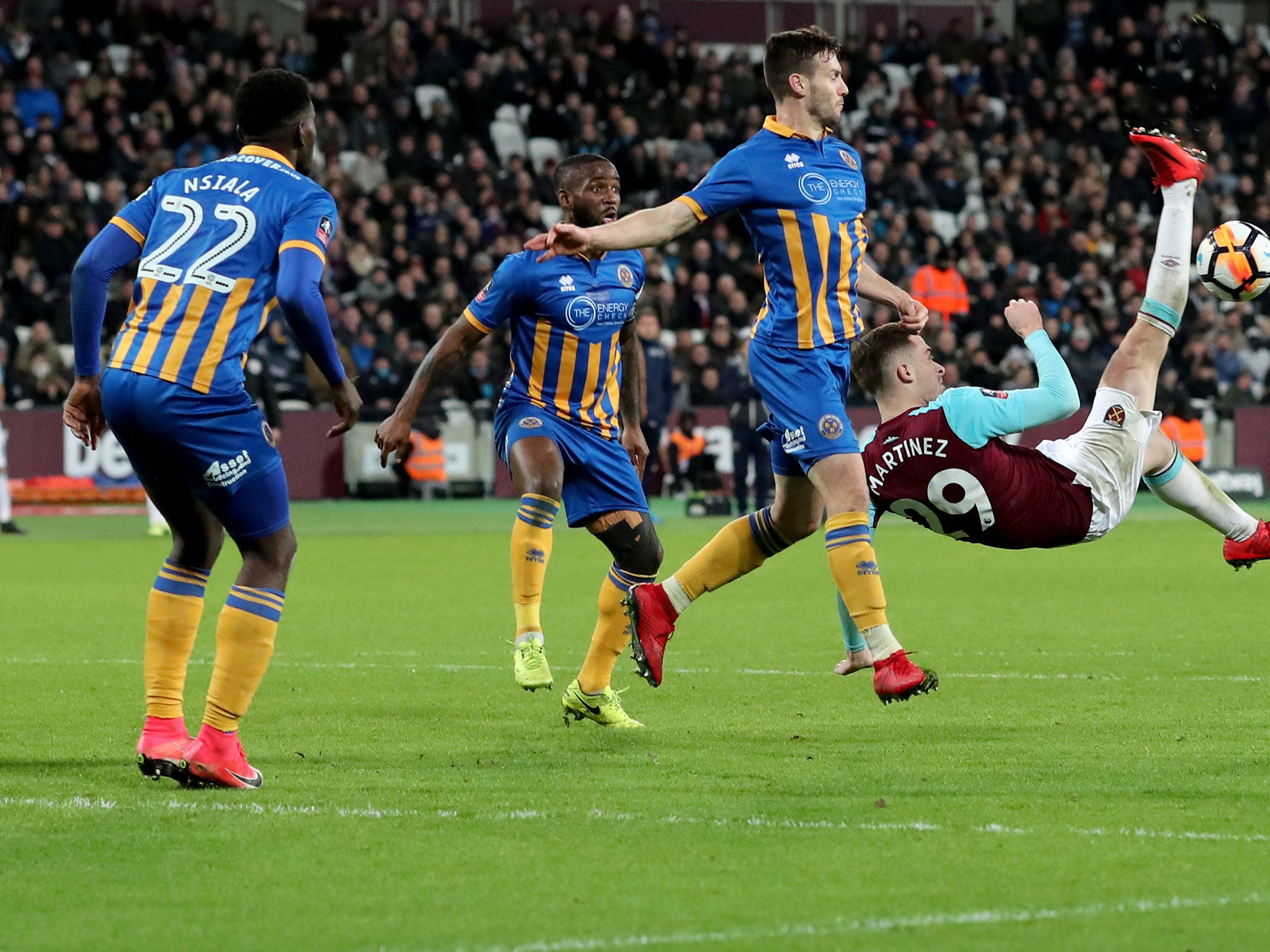 Toni Martinez attempts an overhead kick for West Ham