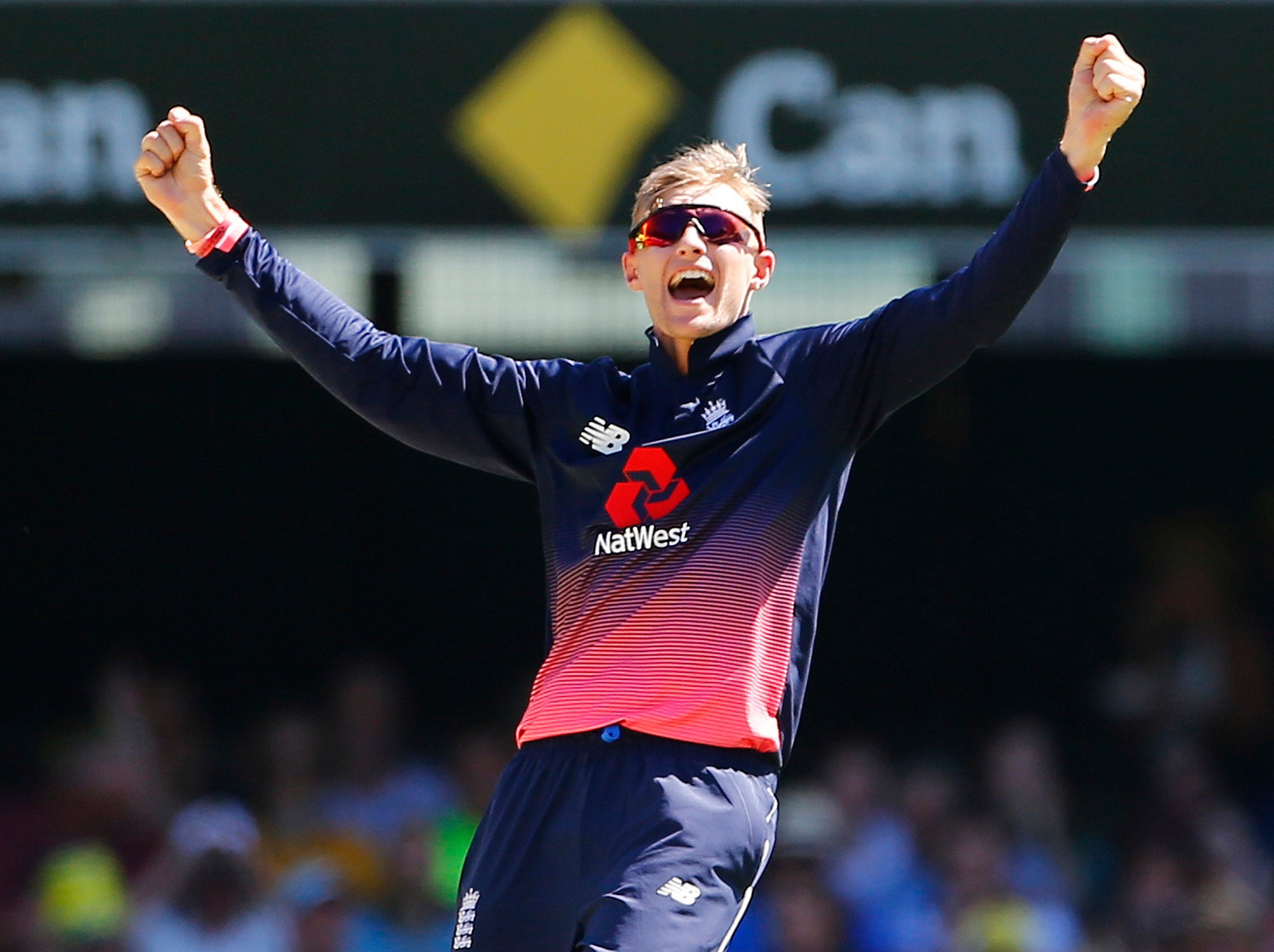 Joe Root celebrates taking the wicket of Steve Smith