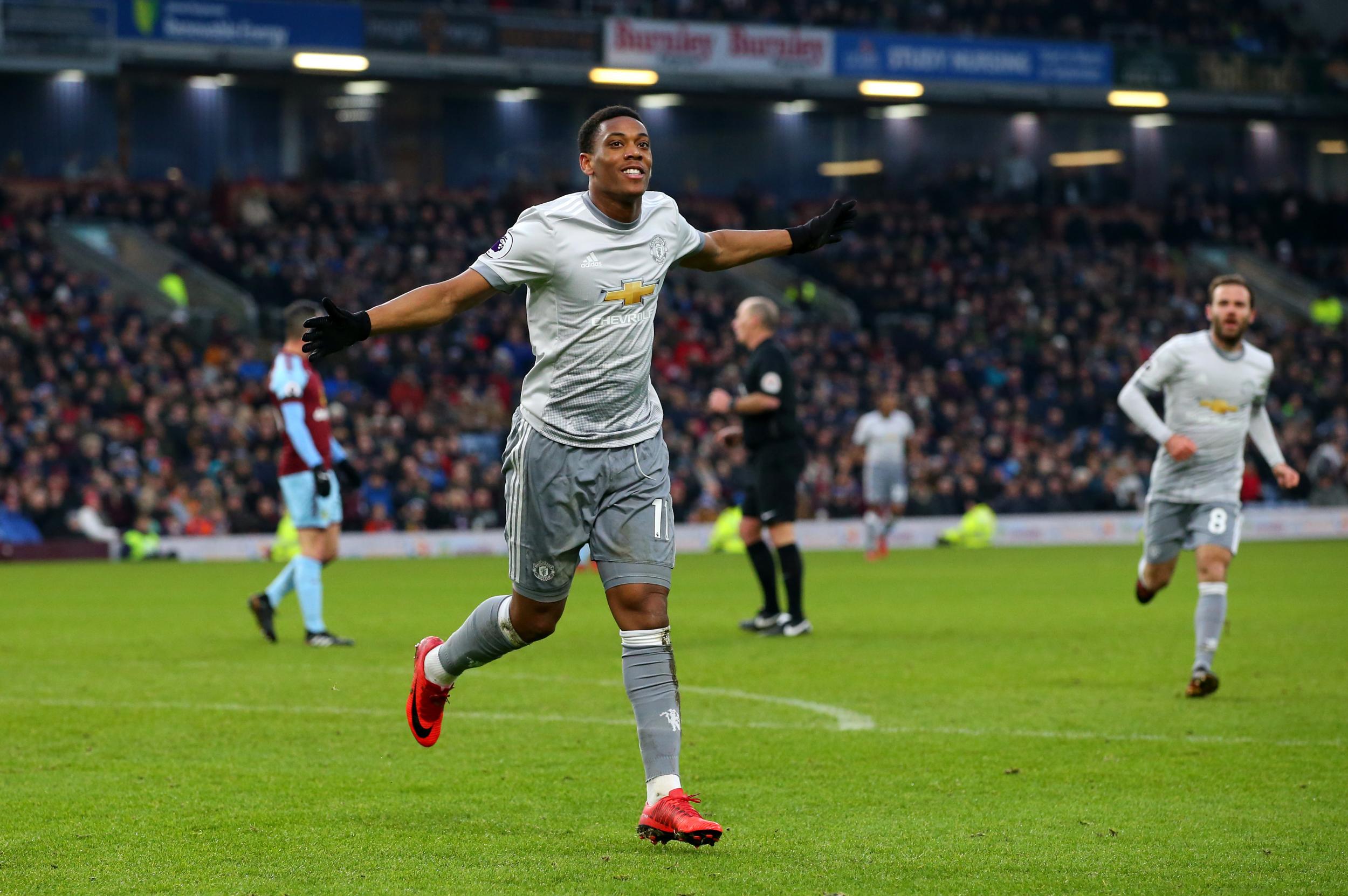 United briefly reduced the deficit to nine points with victory at Burnley