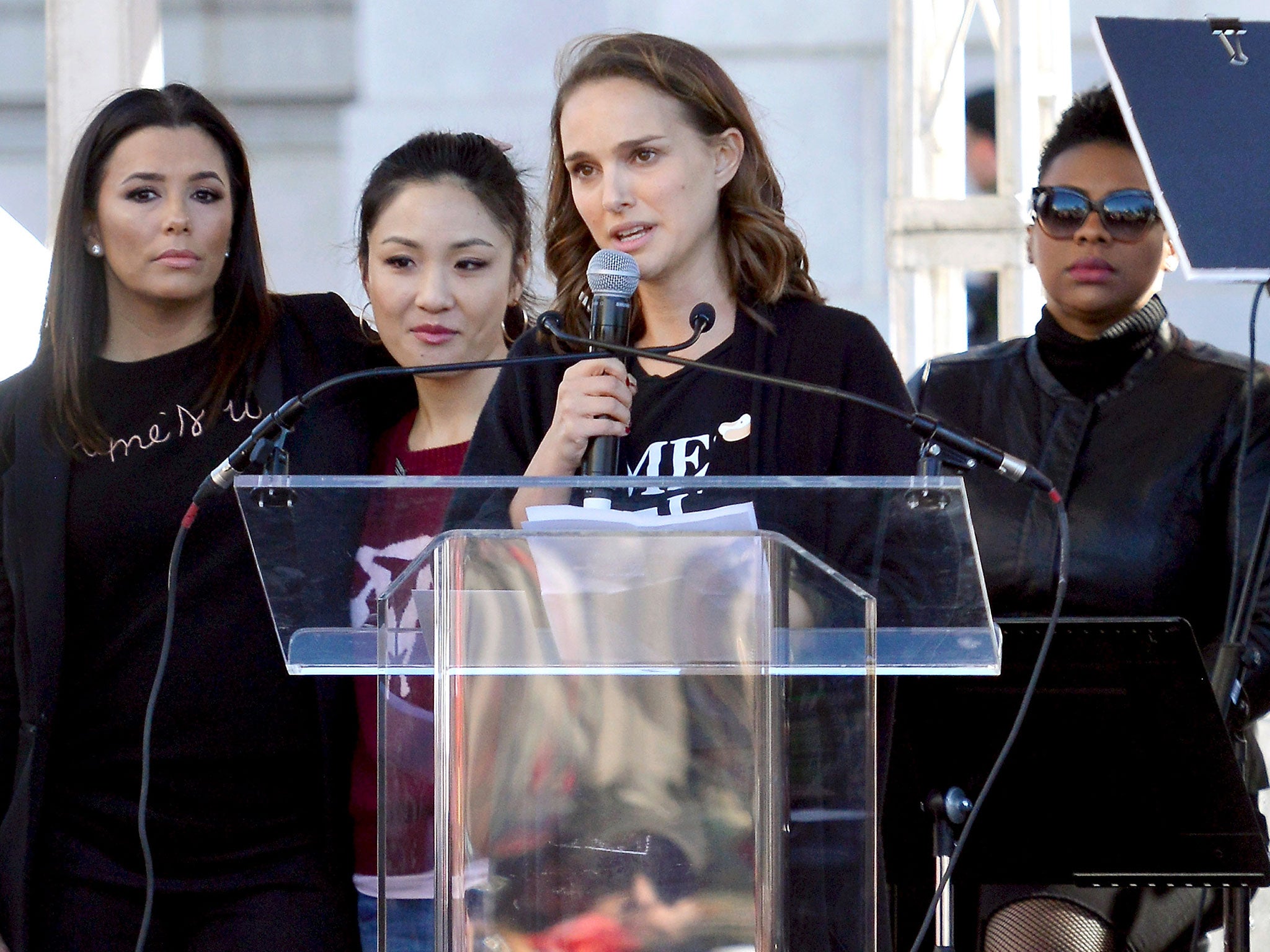 Actors Eva Longoria, Constance Wu and Natalie Portman speak during the Women's March on 20 January 2018 in Los Angeles, California.