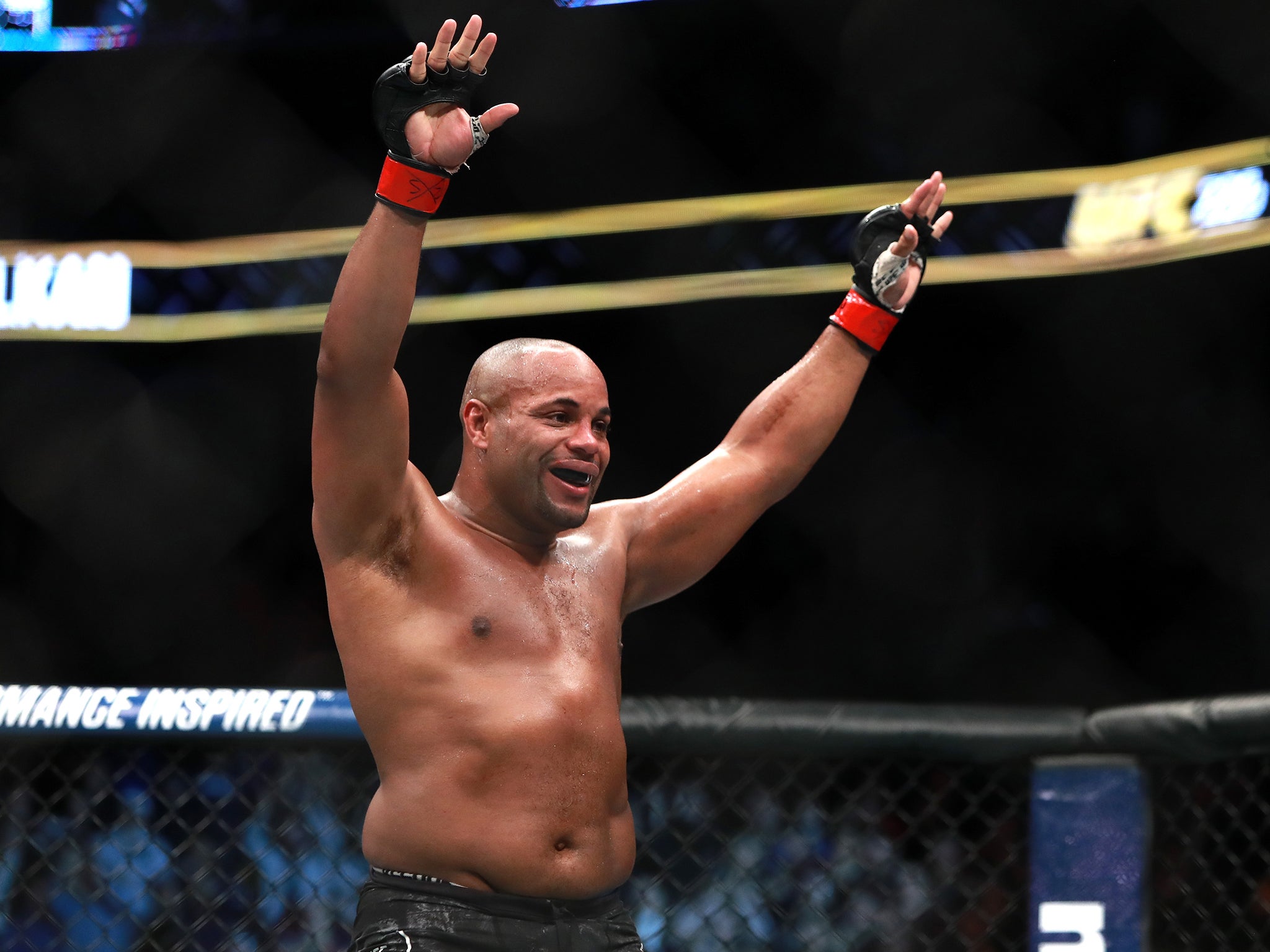 Daniel Cormier celebrates his victory over Volkan Oezdemir