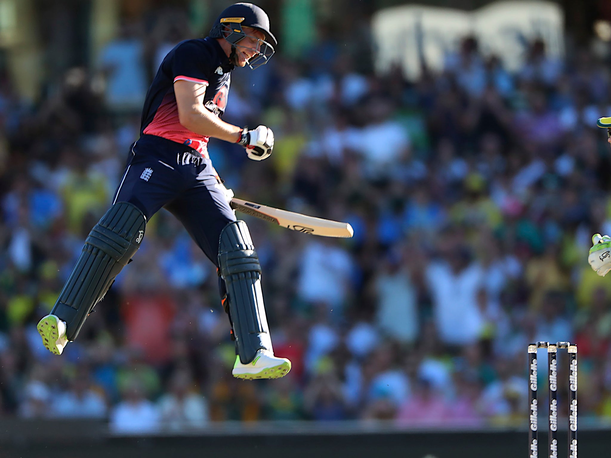 Jos Buttler celebrates after reaching 100 not-out