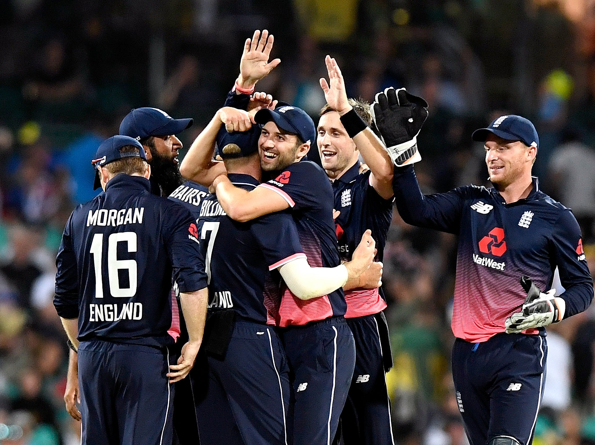 England celebrate Chris Woakes taking the wicket of Marcus Stoinis