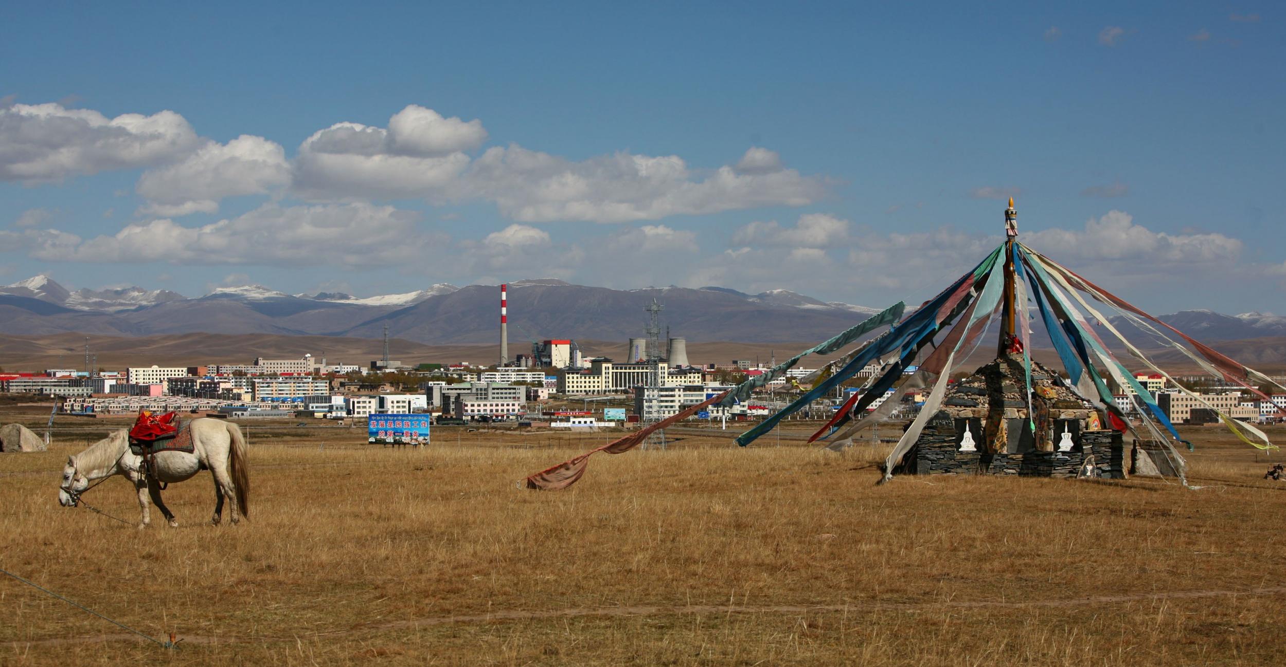 A Tibetan cairn near the new city located on the site