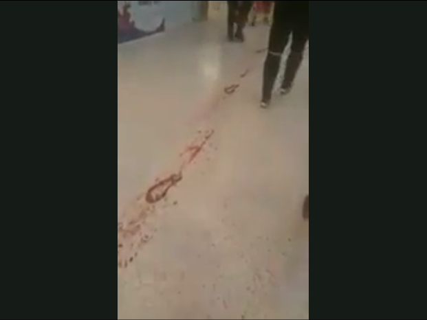 Footage from the scene appears to show bloody footprints