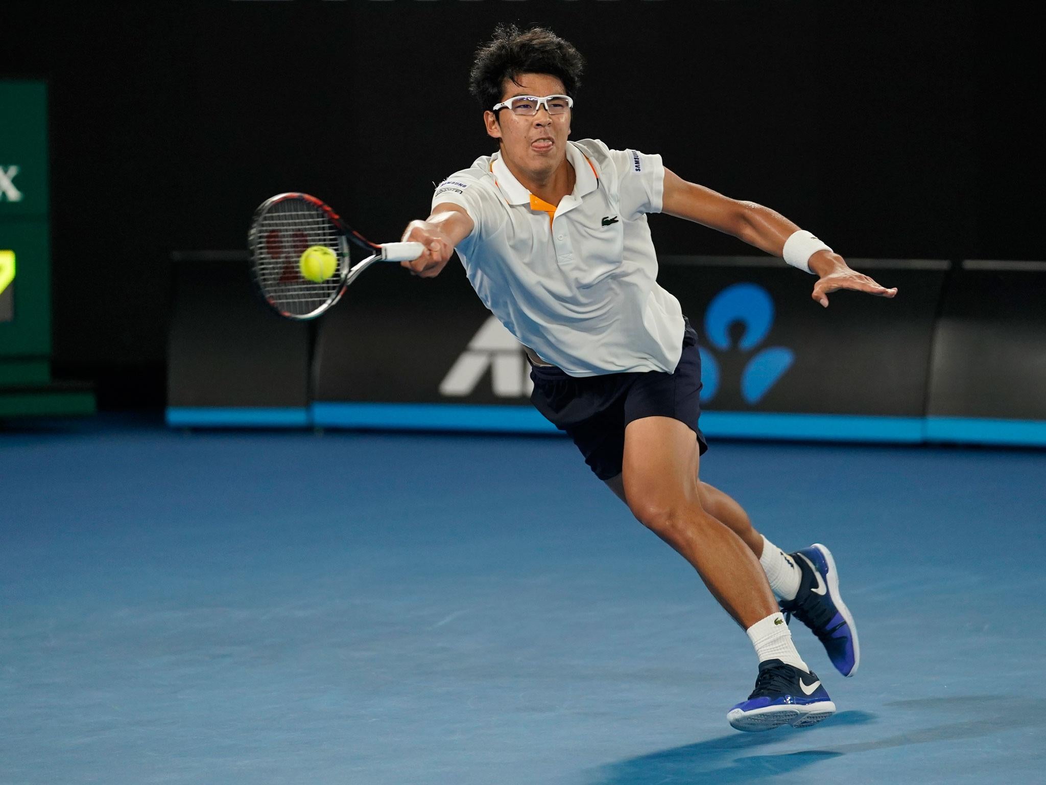 Chung in action against Djokovic during the second set