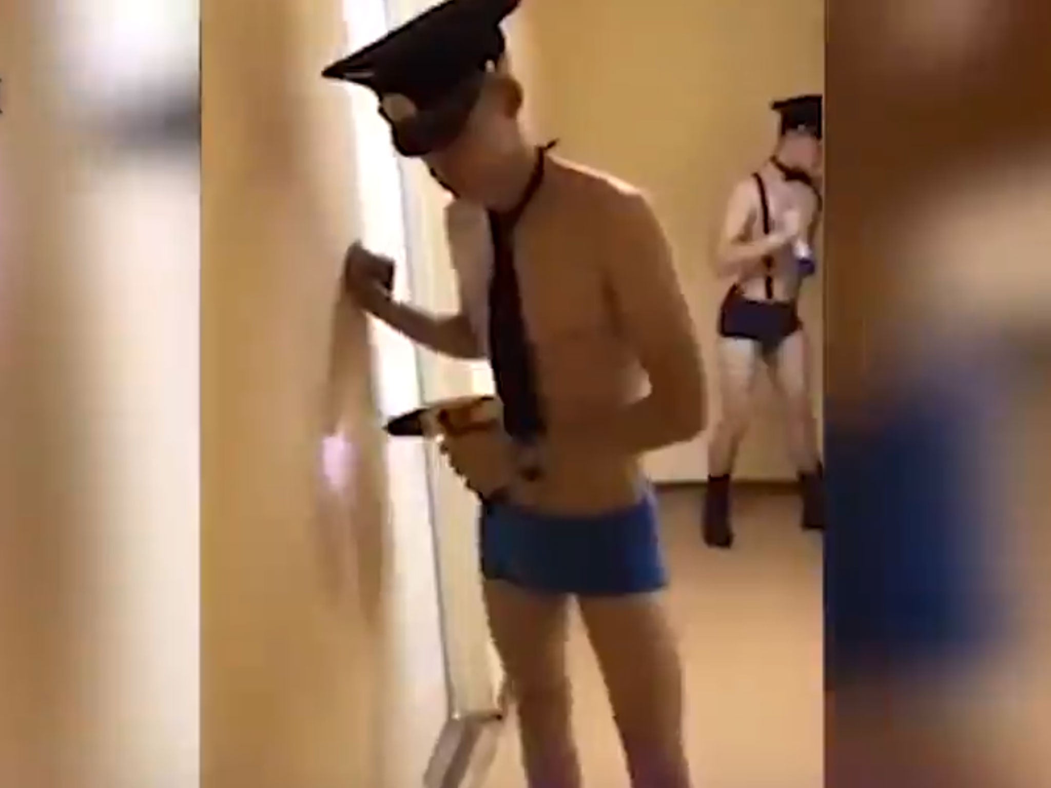 Half-naked male cadets from Ulyanovsk Civil Aviation Institute dance to the music